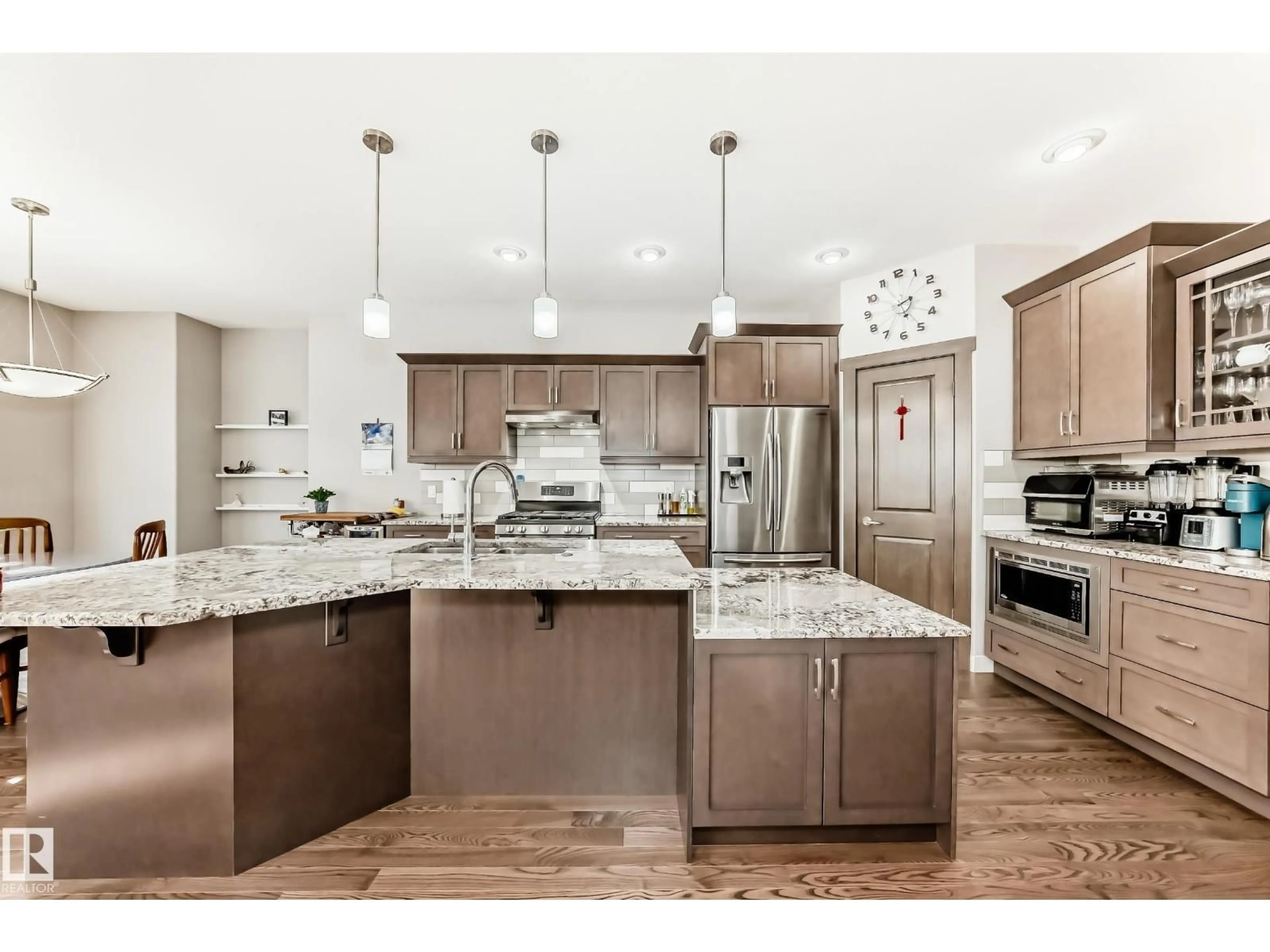Open concept kitchen, unknown for NW - 7719 GETTY WD, Edmonton Alberta T5T4L3