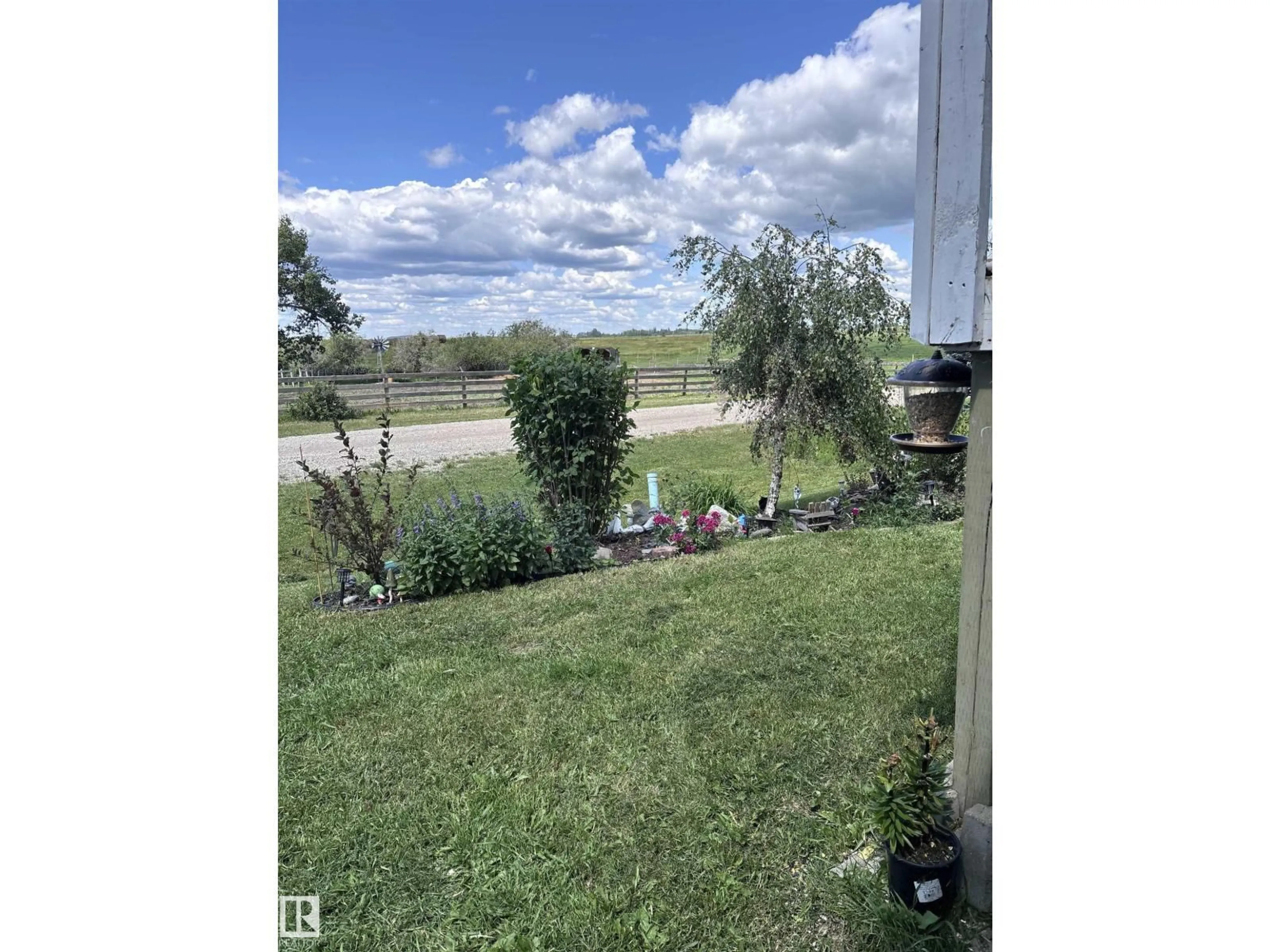 A pic from outside/outdoor area/front of a property/back of a property/a pic from drone, water/lake/river/ocean view for 26500 - 225 HWY 44, Rural Sturgeon County Alberta T8R0J3