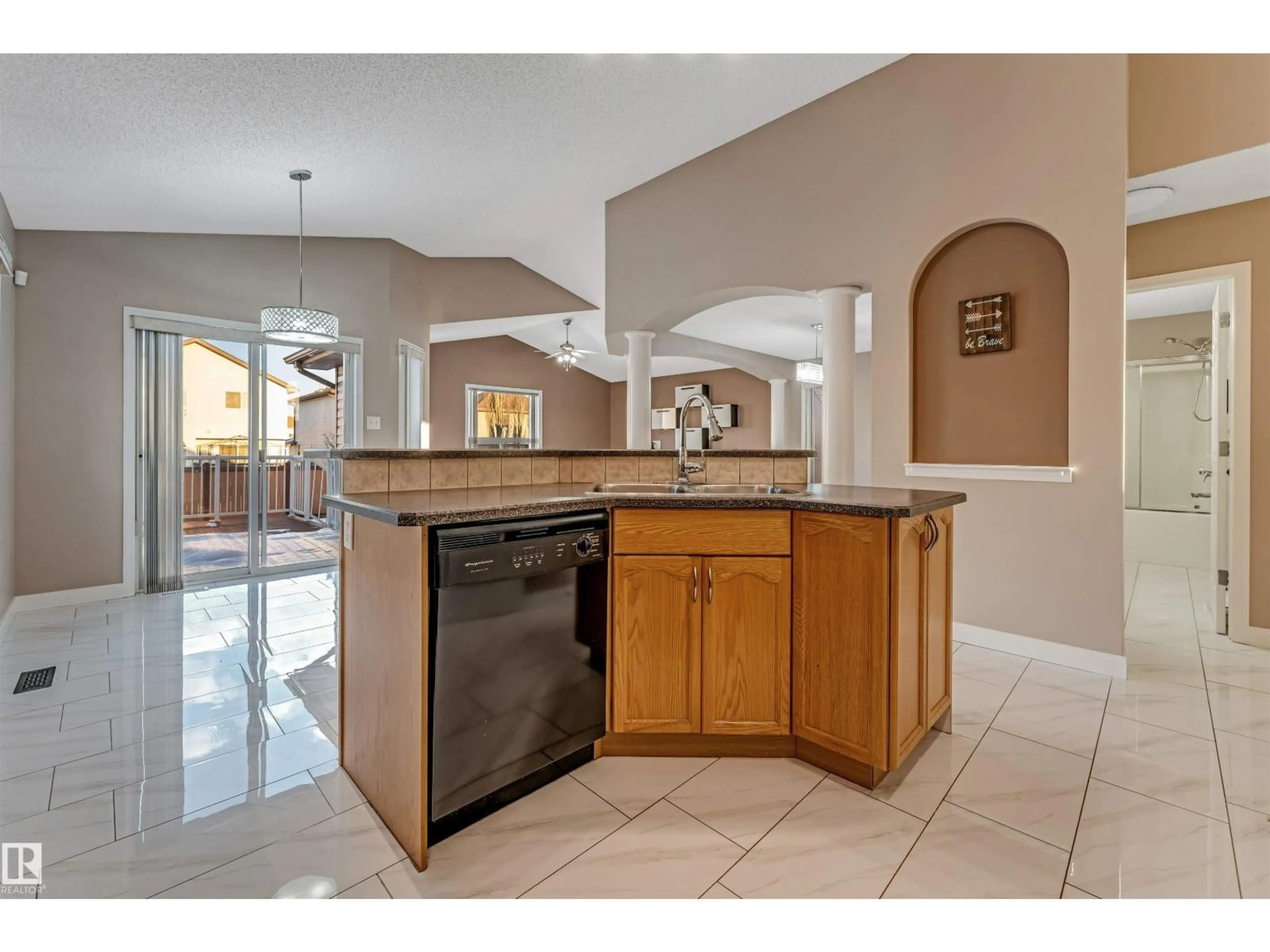 Open concept kitchen, ceramic/tile floor for 3331 26 ST, Edmonton Alberta T6T1Z4