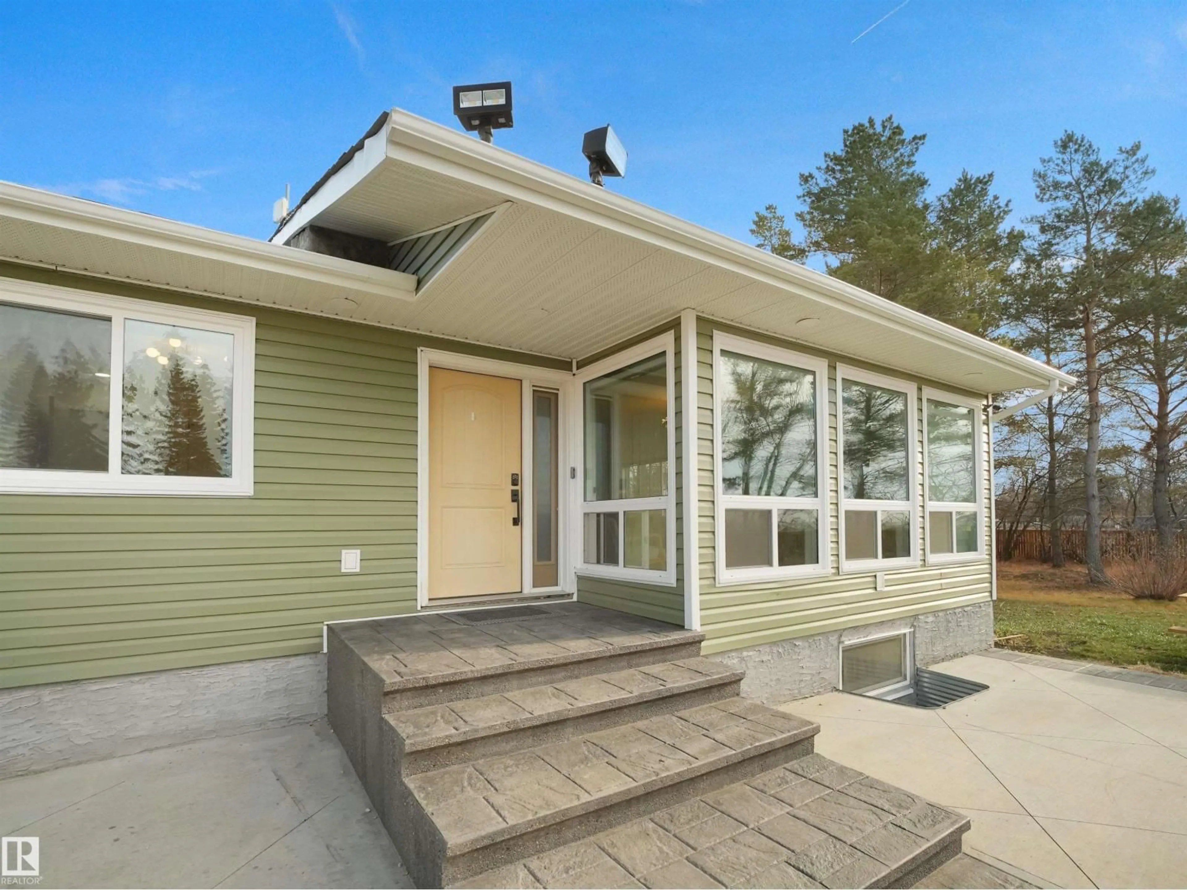 Home with vinyl exterior material, street for 55005 RGE 241 RD, Rural Sturgeon County Alberta T8T1W3