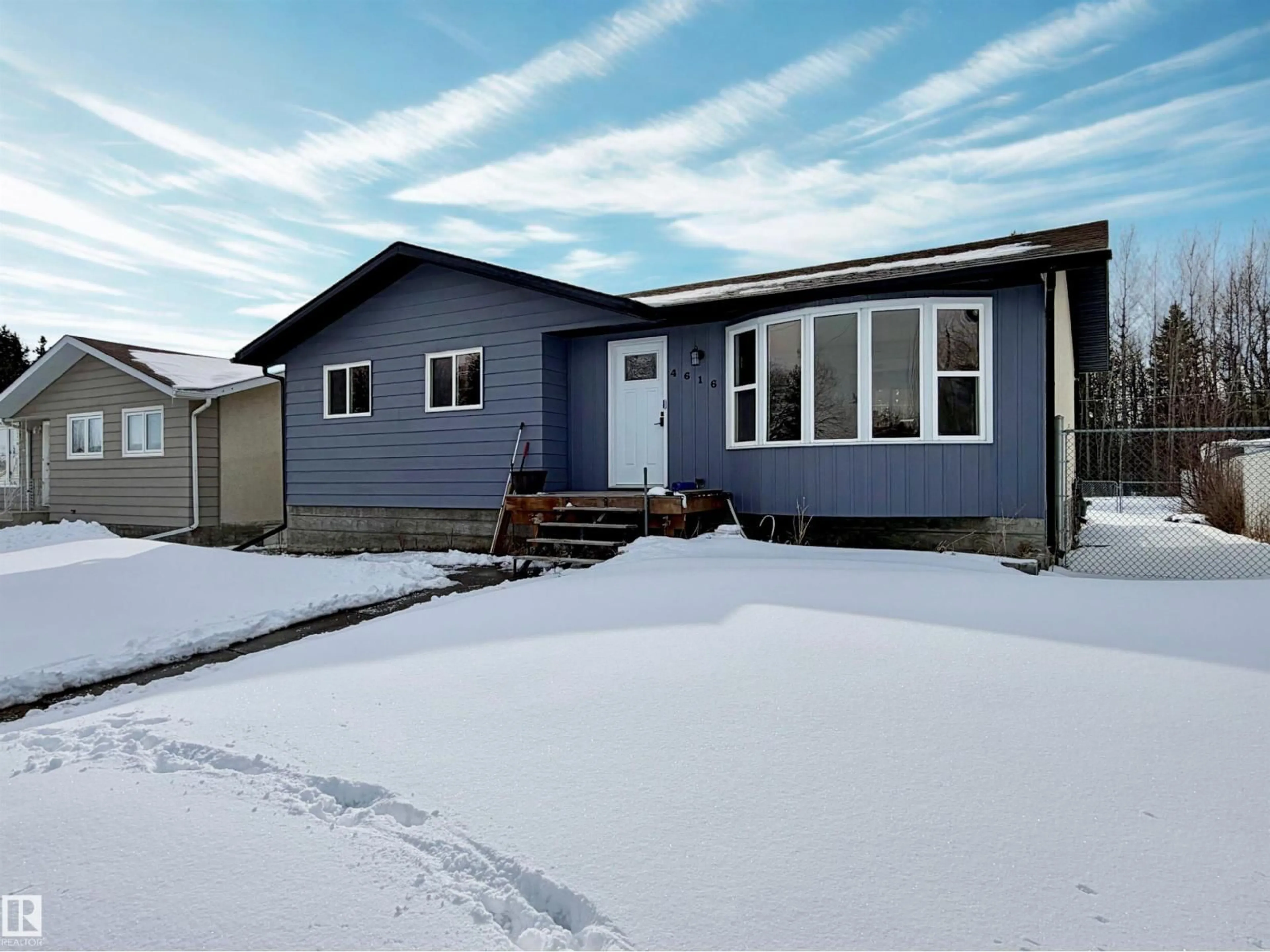 Home with vinyl exterior material, street for 4616 56 ST, Drayton Valley Alberta T7A1K1