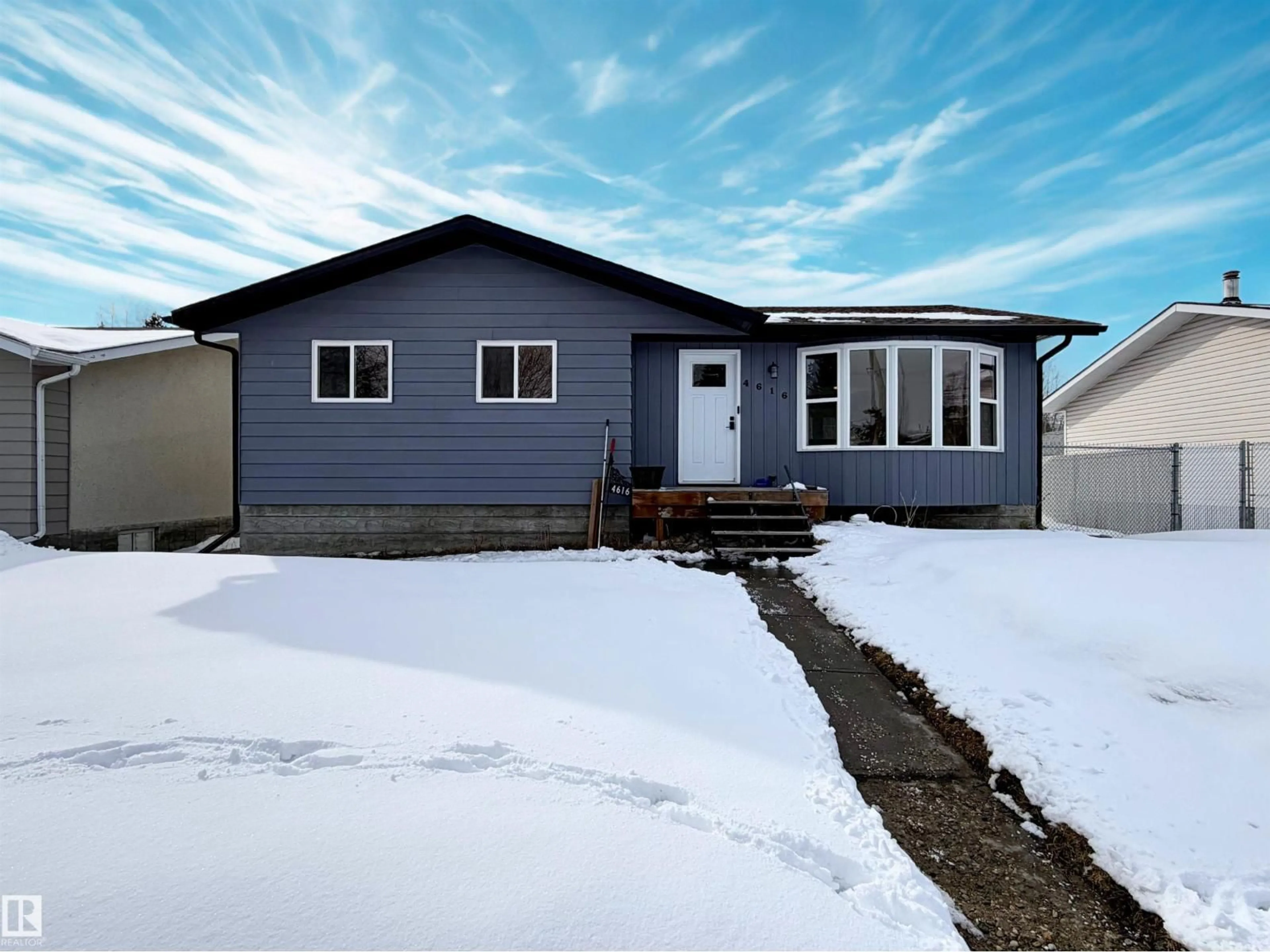 Home with vinyl exterior material, street for 4616 56 ST, Drayton Valley Alberta T7A1K1