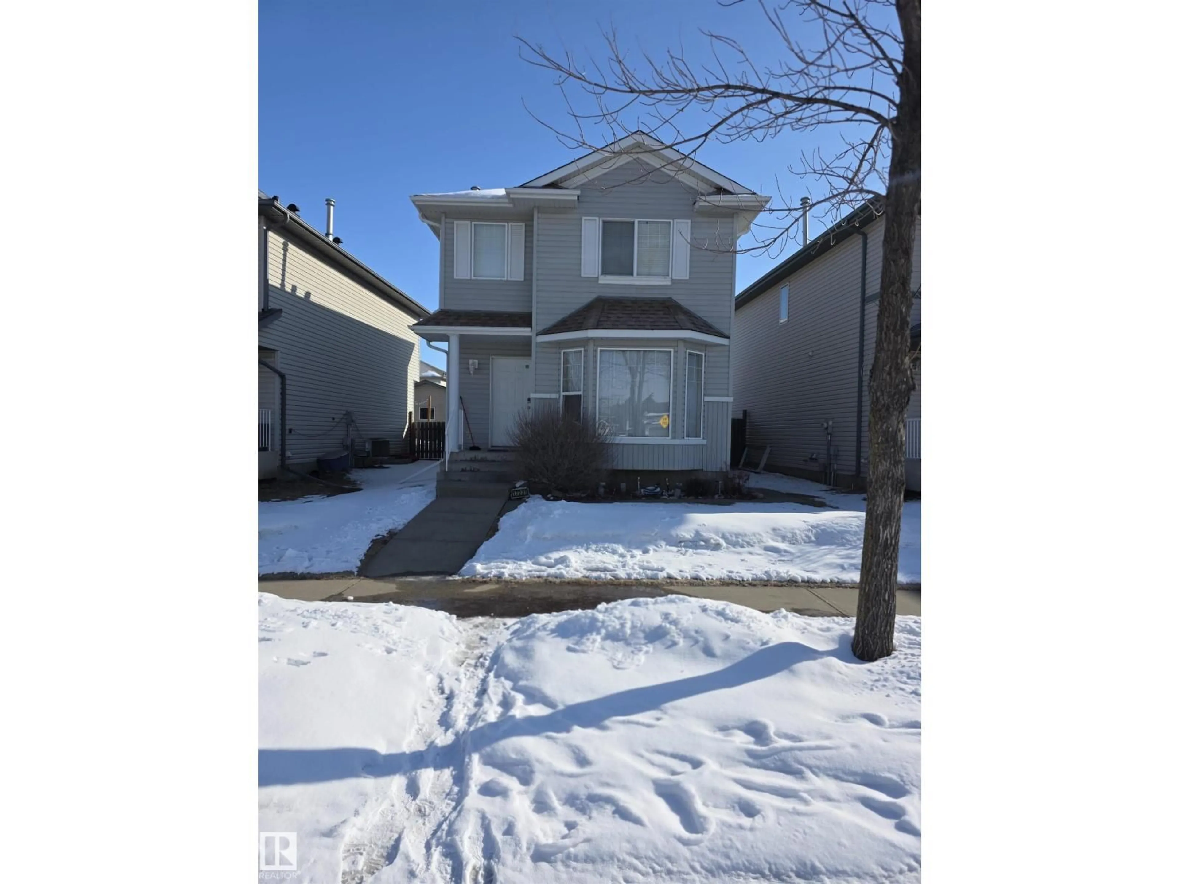 Home with vinyl exterior material, street for 17231 88 ST, Edmonton Alberta T5Z3R4