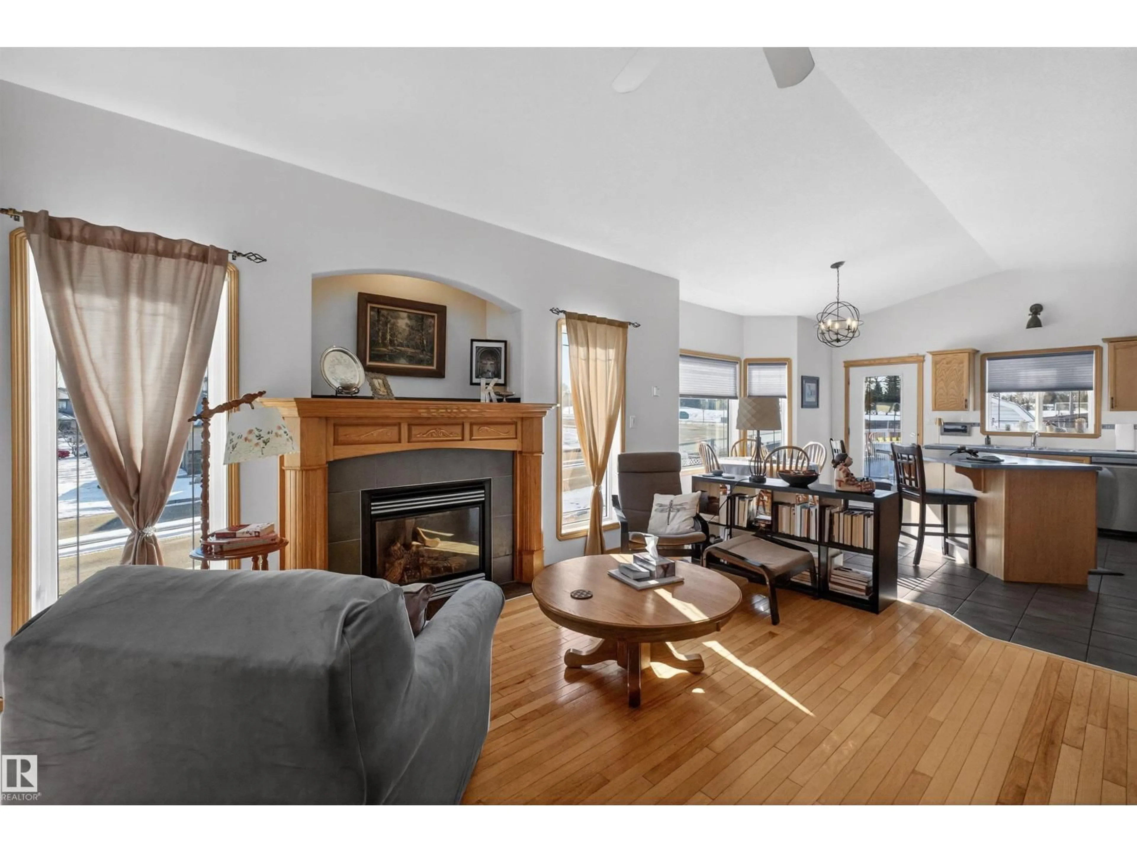 Living room with furniture, wood/laminate floor for 21 HALVERSON CO, Spruce Grove Alberta T7X4P7