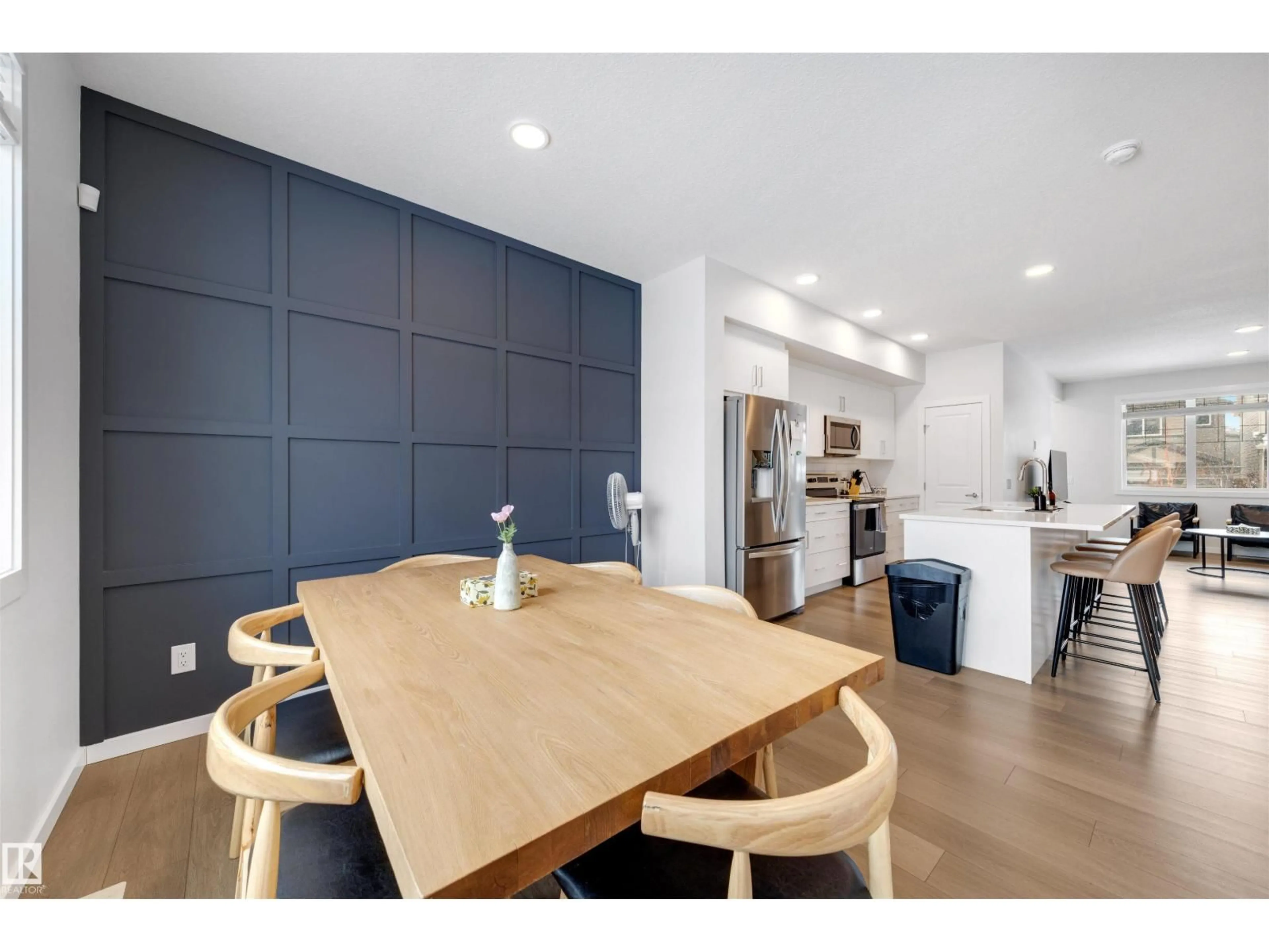 Open concept kitchen, wood/laminate floor for NW - 8125 226A ST, Edmonton Alberta T5T7S8