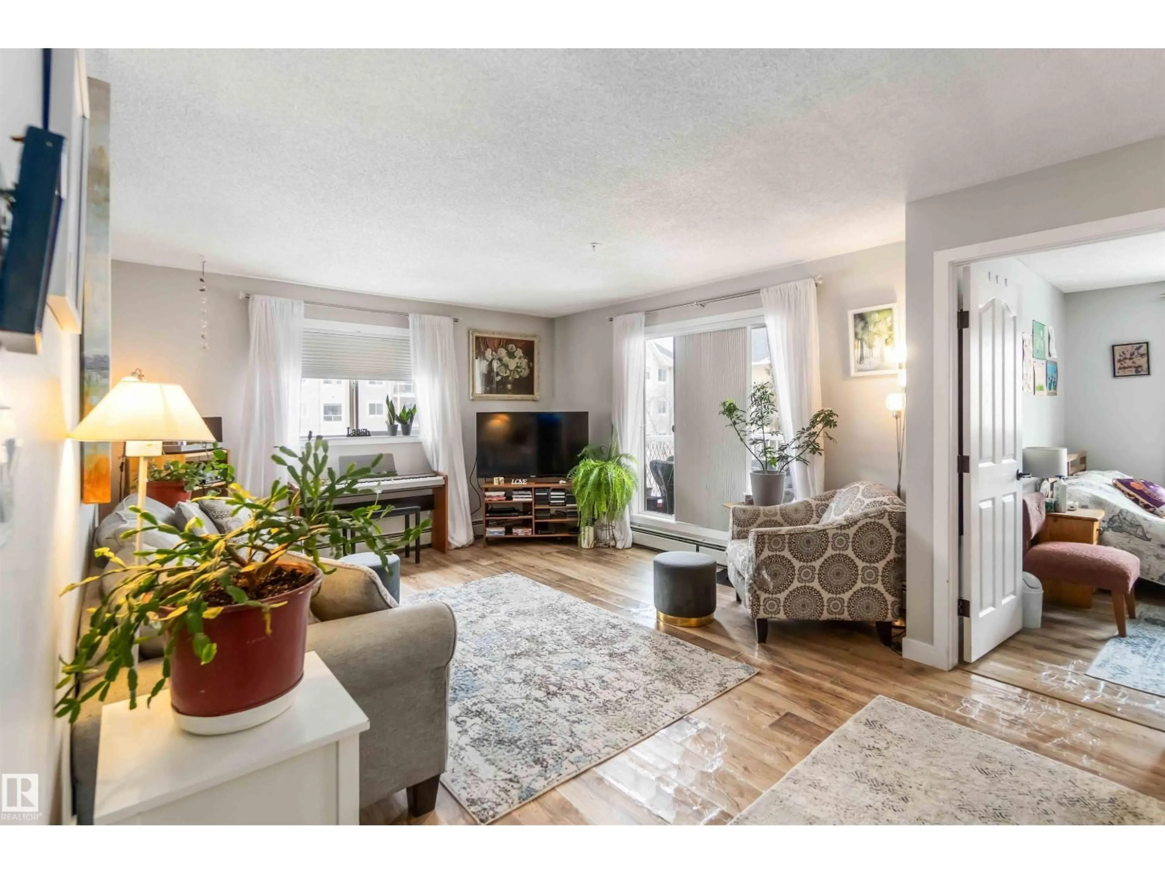 Living room with furniture, unknown for 329 17447 98A AV, Edmonton Alberta T5T6M4