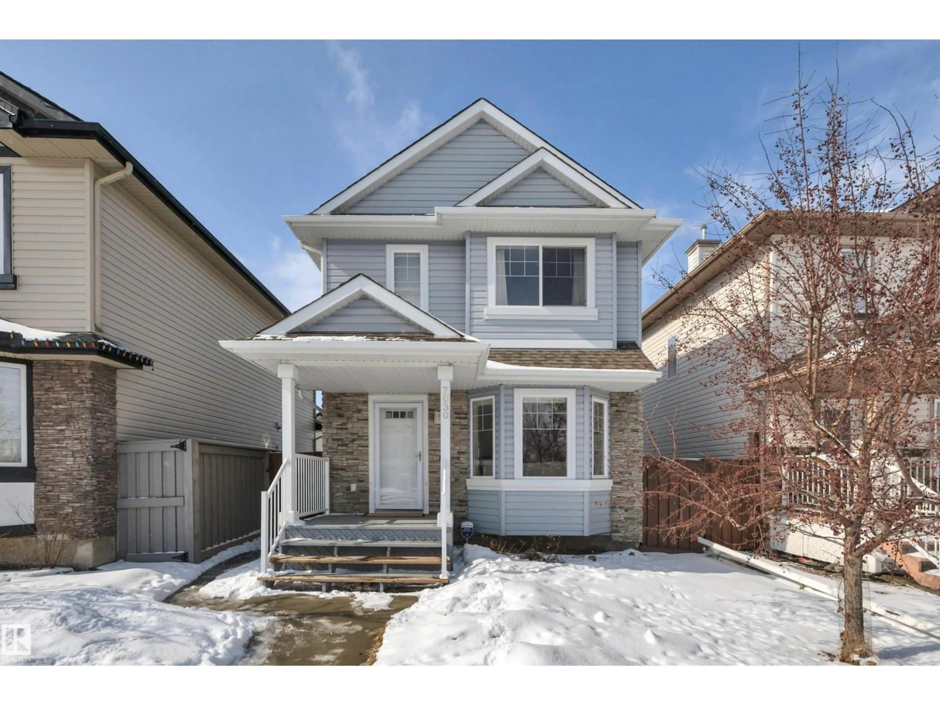 Home with vinyl exterior material, street for 7030 SOUTH TERWILLEGAR DR, Edmonton Alberta T6R3V7