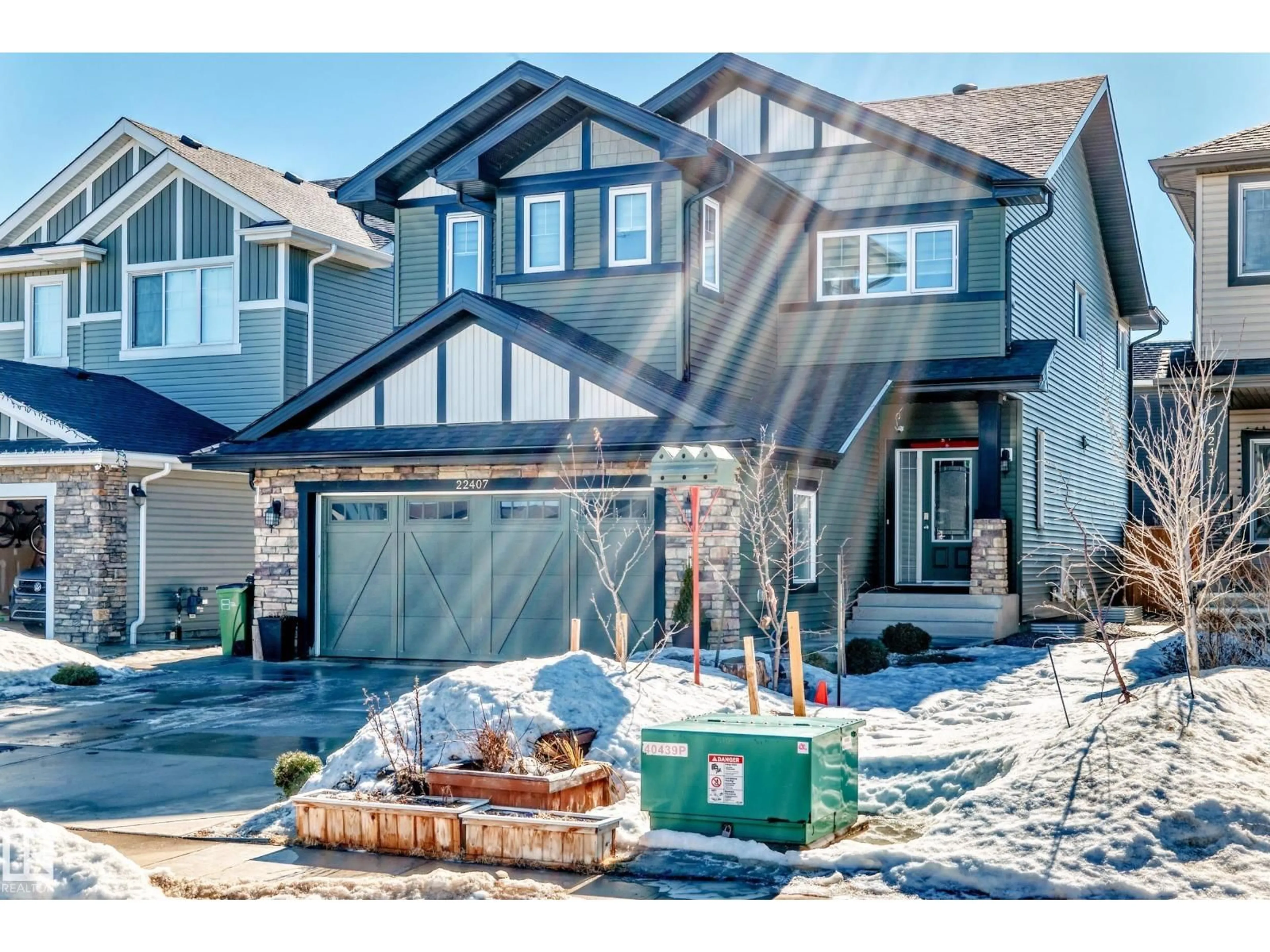 Home with vinyl exterior material, street for 22407 99 AV, Edmonton Alberta T5T7C2