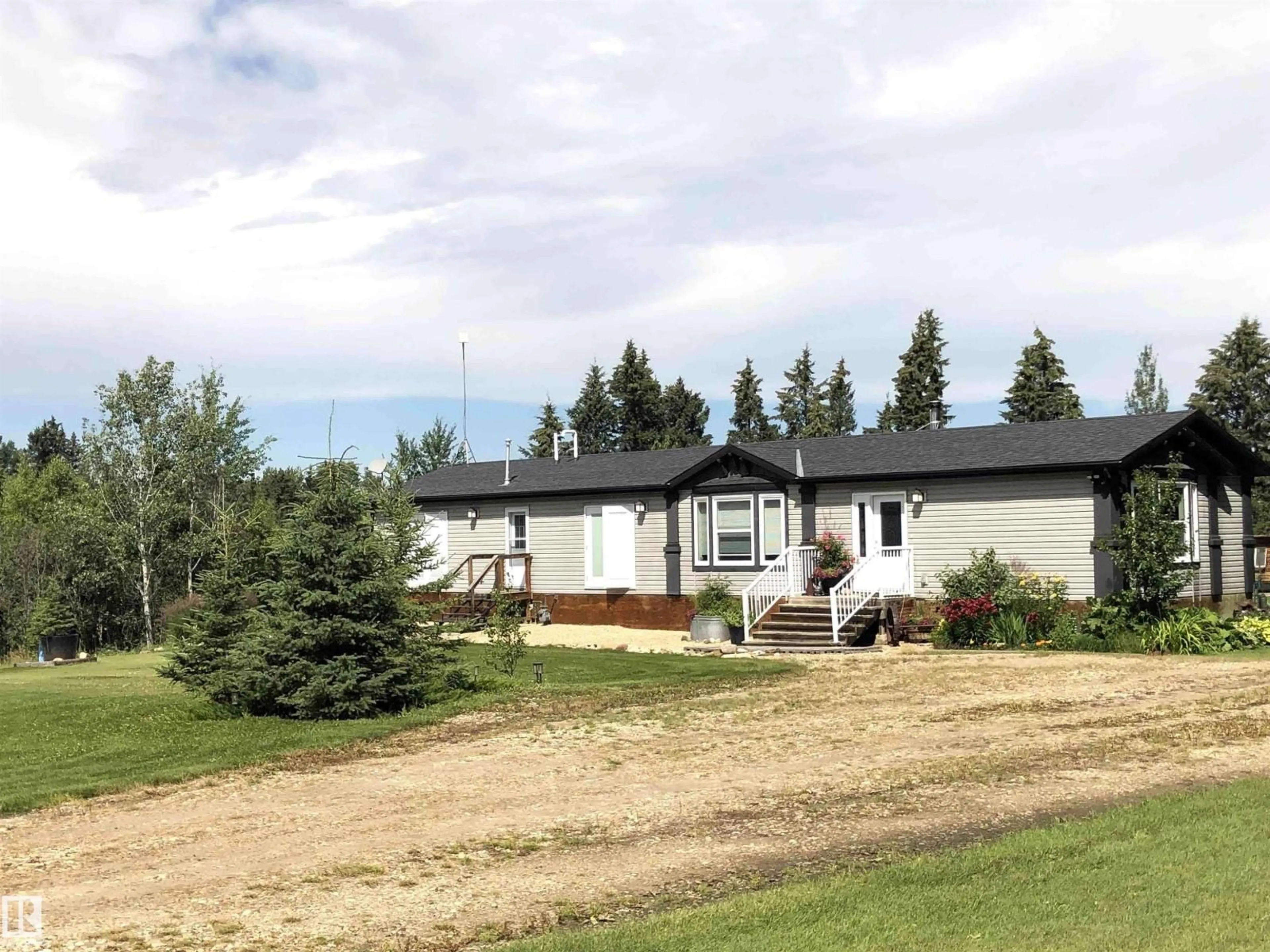 A pic from outside/outdoor area/front of a property/back of a property/a pic from drone, mountain view for 463025 RGE ROAD 40 A, Rural Wetaskiwin County Alberta T0C2X0