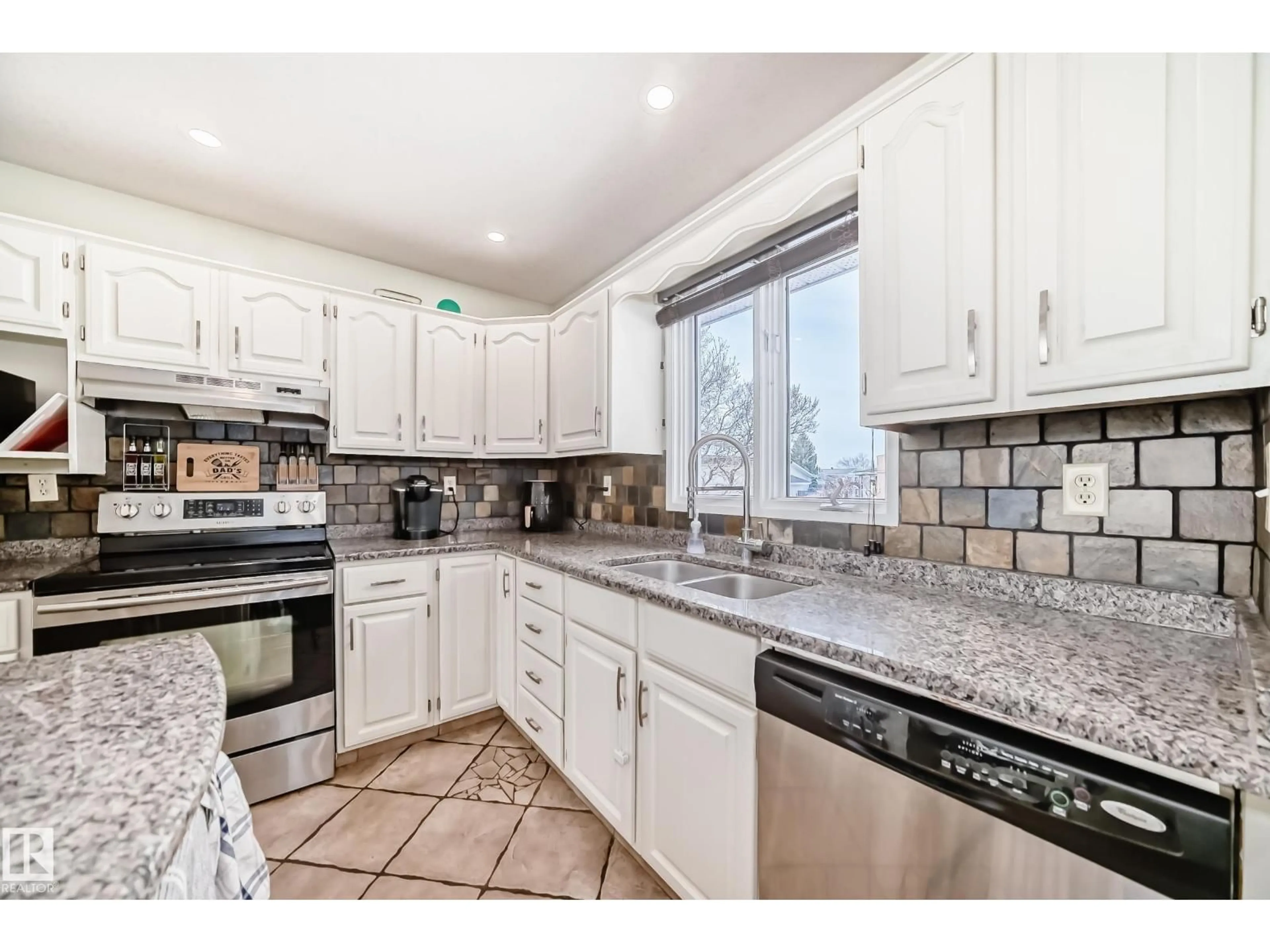 Open concept kitchen, ceramic/tile floor for 16232 100 ST, Edmonton Alberta T5X4R7