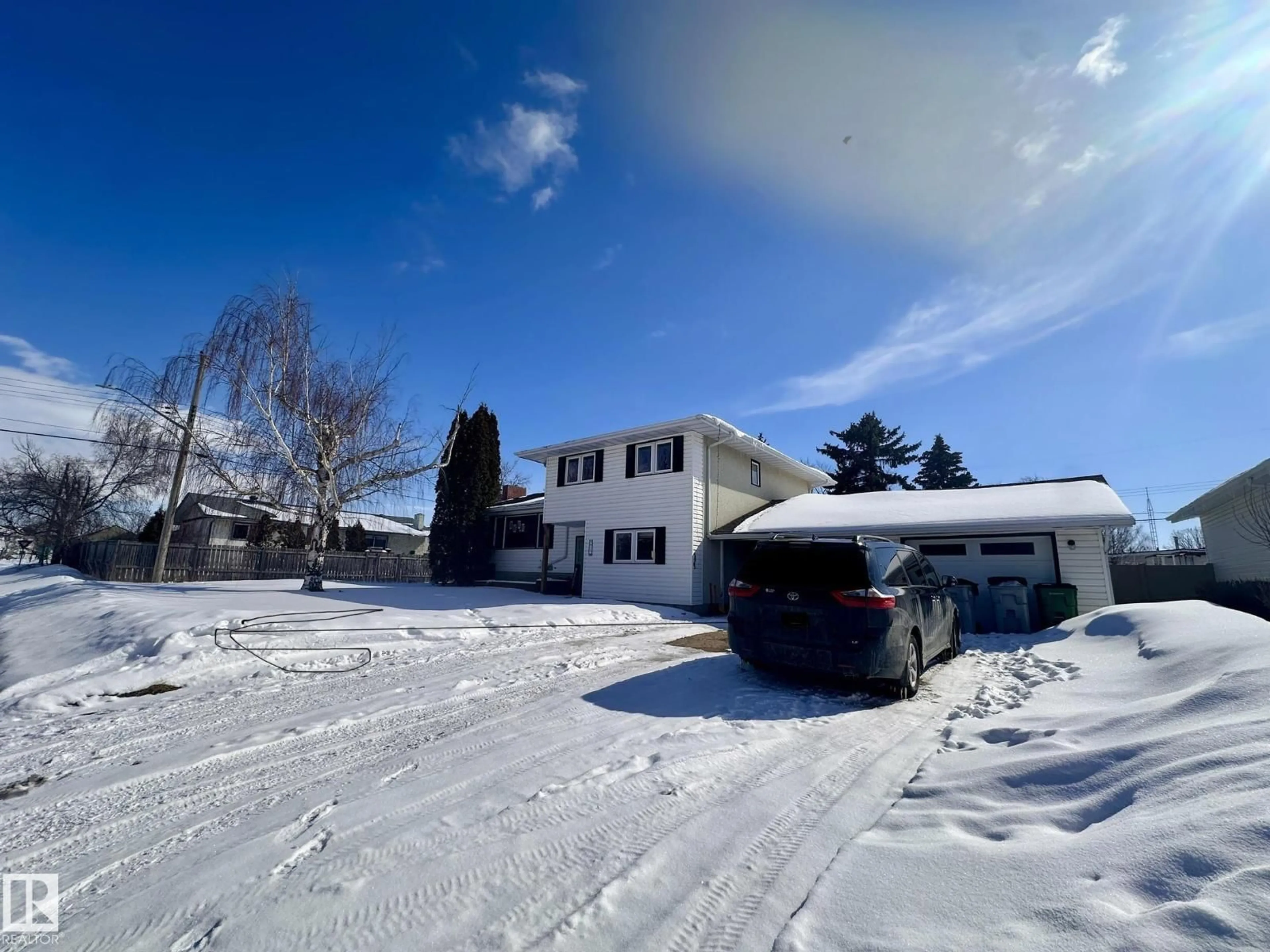 A pic from outside/outdoor area/front of a property/back of a property/a pic from drone, street for 9915 95 ST, Westlock Alberta T7P2B4