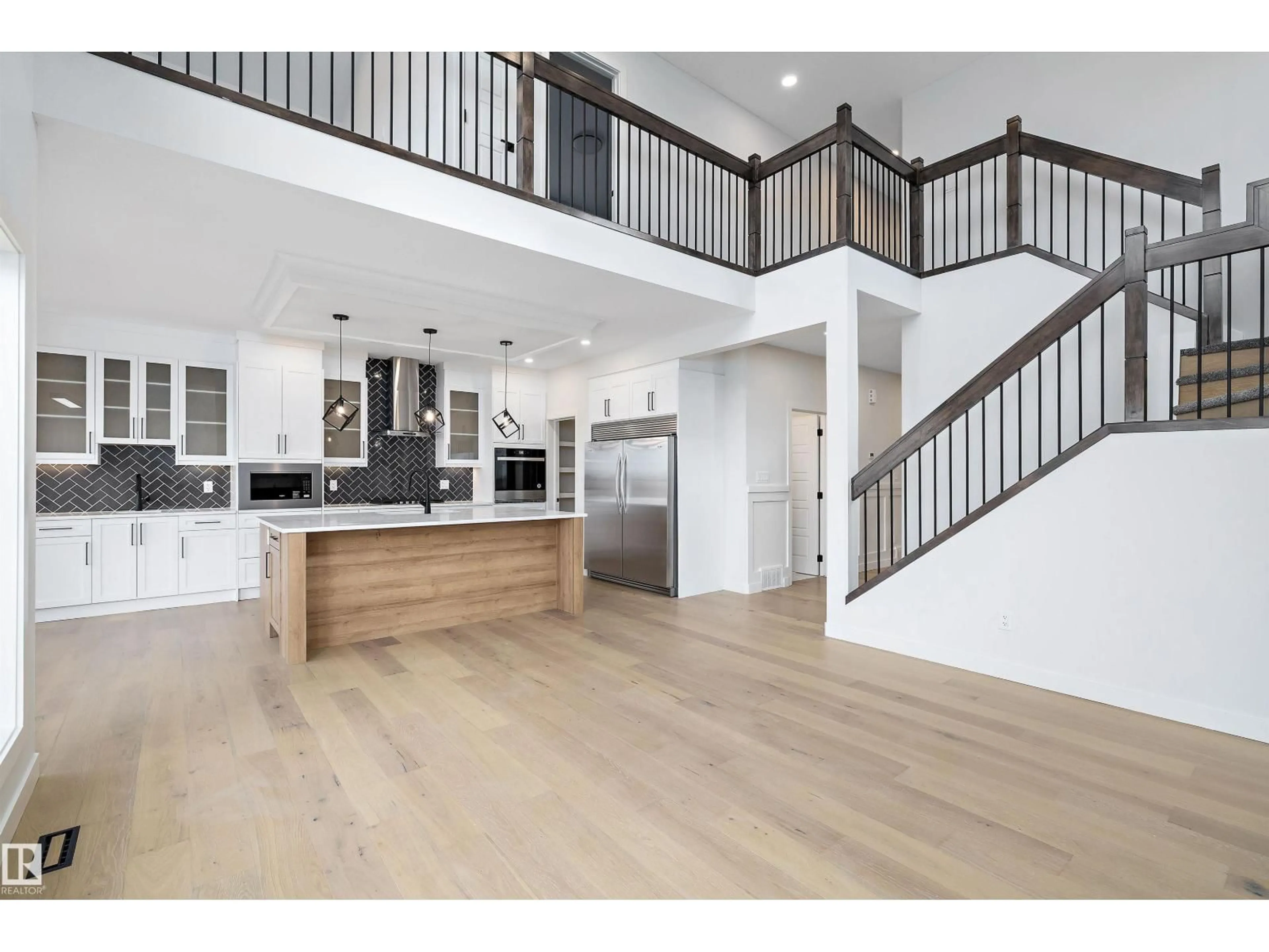 Open concept kitchen, wood/laminate floor for 34 CANNES CV, St. Albert Alberta T8T2C6