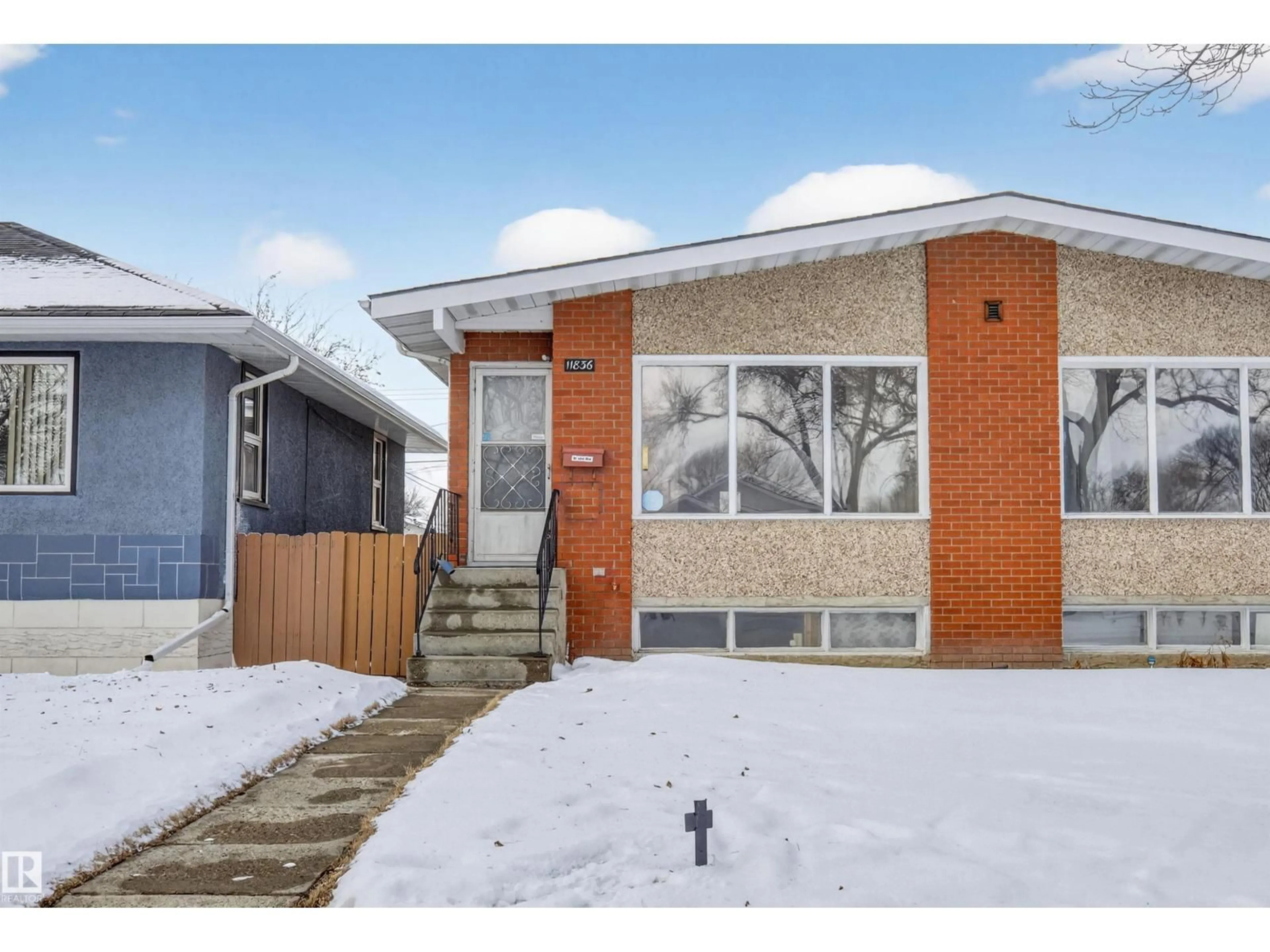 Home with brick exterior material, street for 11836 42 ST, Edmonton Alberta T5W2N4