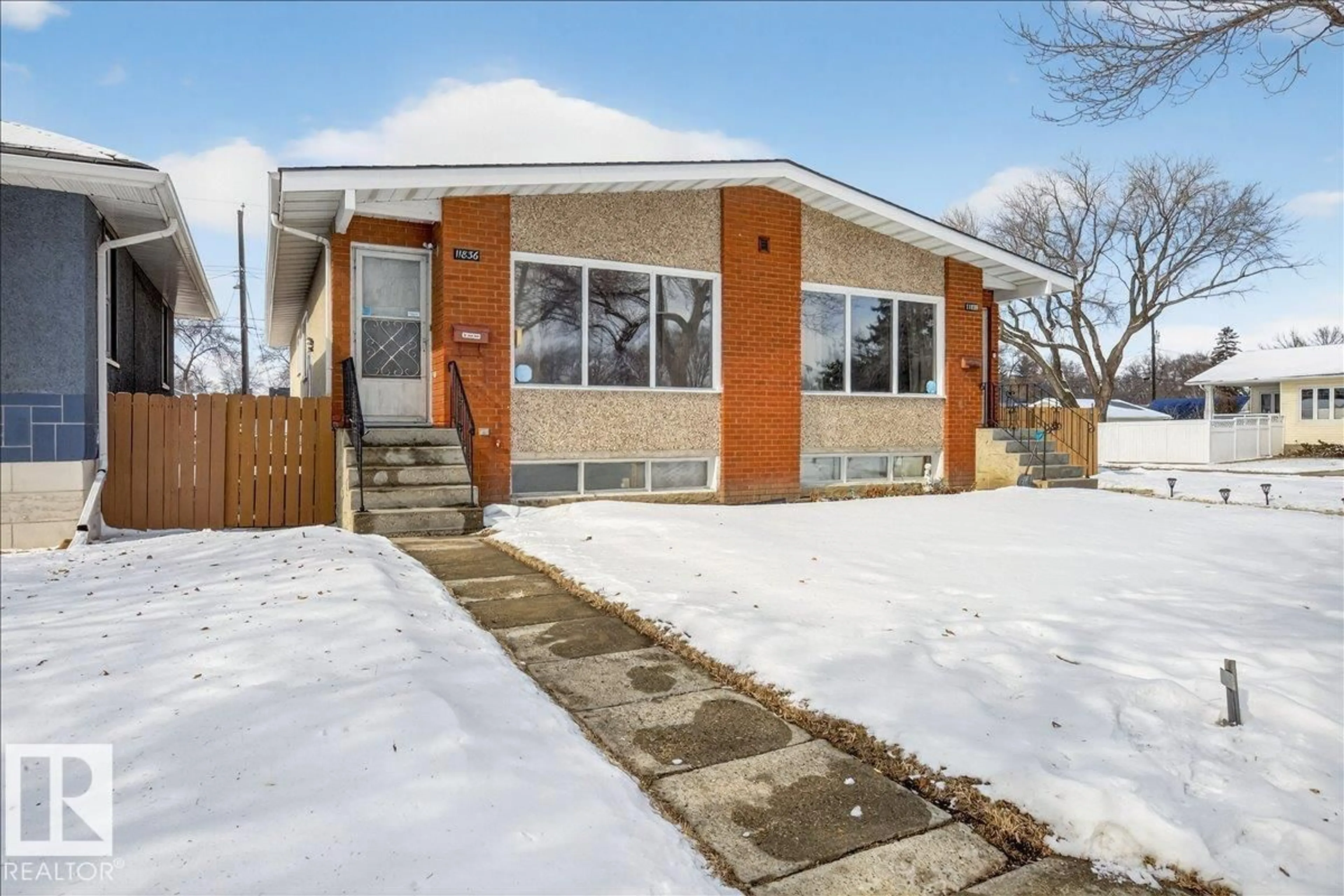 Home with brick exterior material, street for 11836 42 ST, Edmonton Alberta T5W2N4
