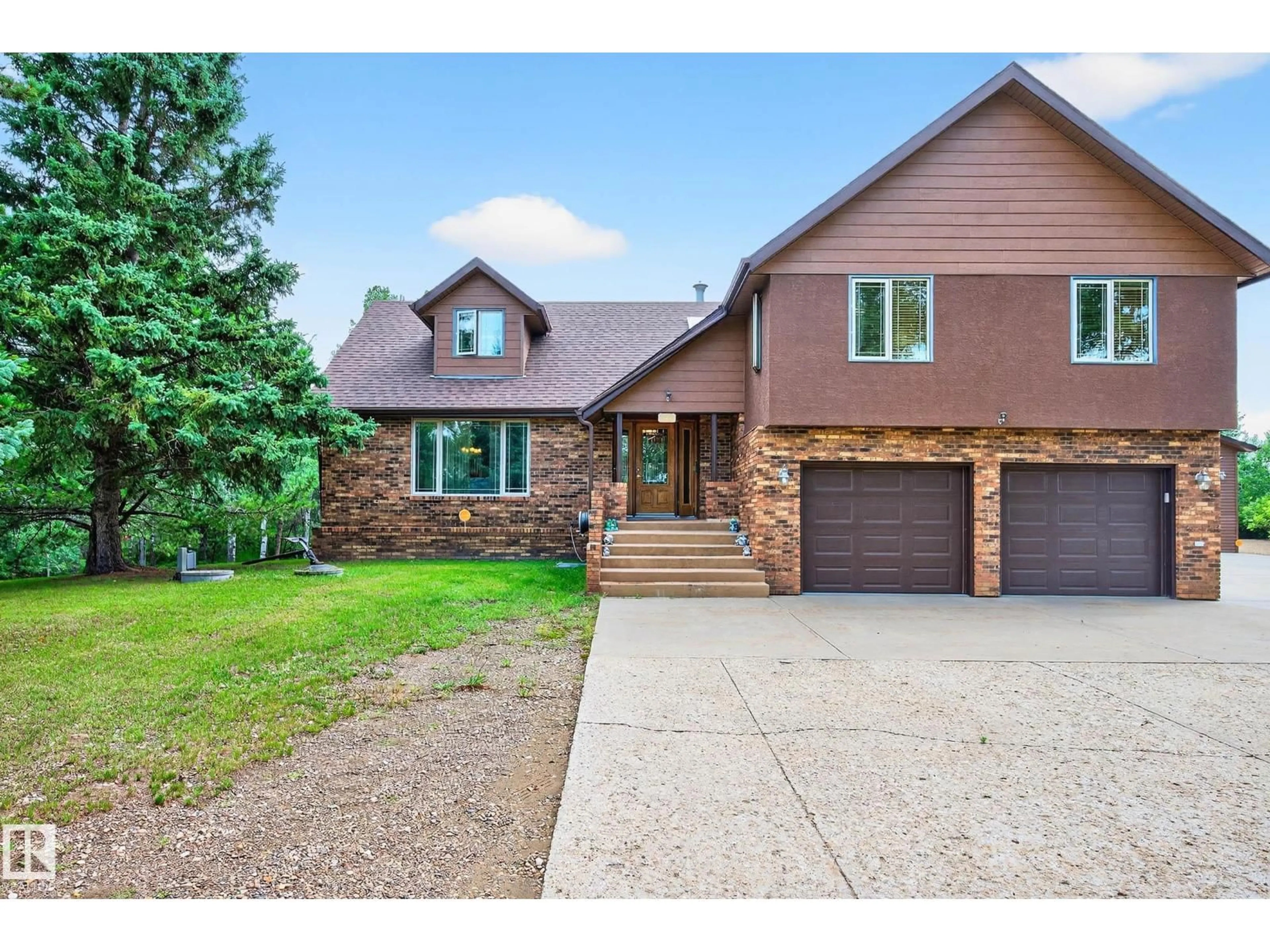 Home with brick exterior material, street for 55 473084 RGE ROAD 242, Rural Wetaskiwin County Alberta T0C1Z0