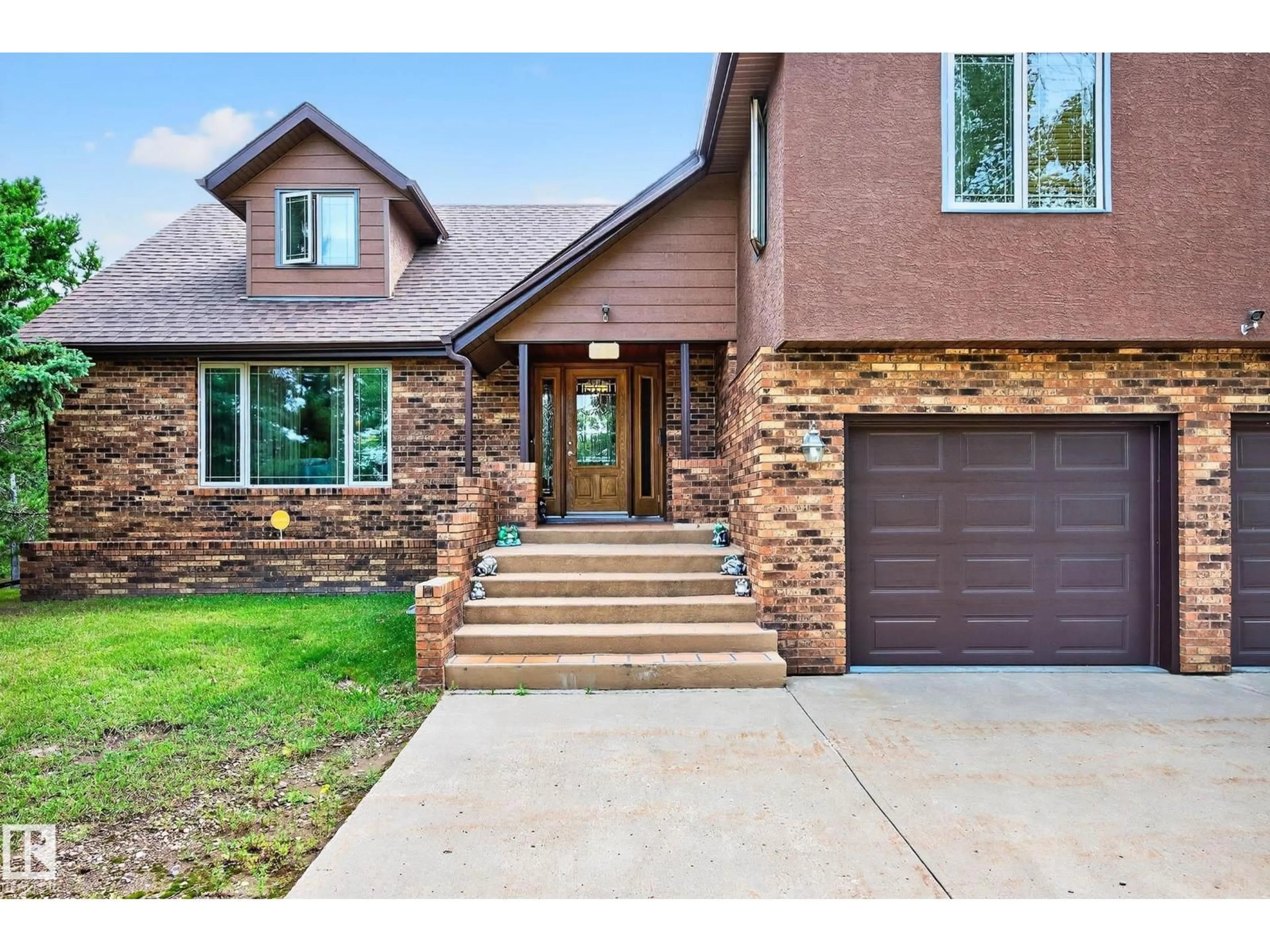 Home with brick exterior material, street for 55 473084 RGE ROAD 242, Rural Wetaskiwin County Alberta T0C1Z0