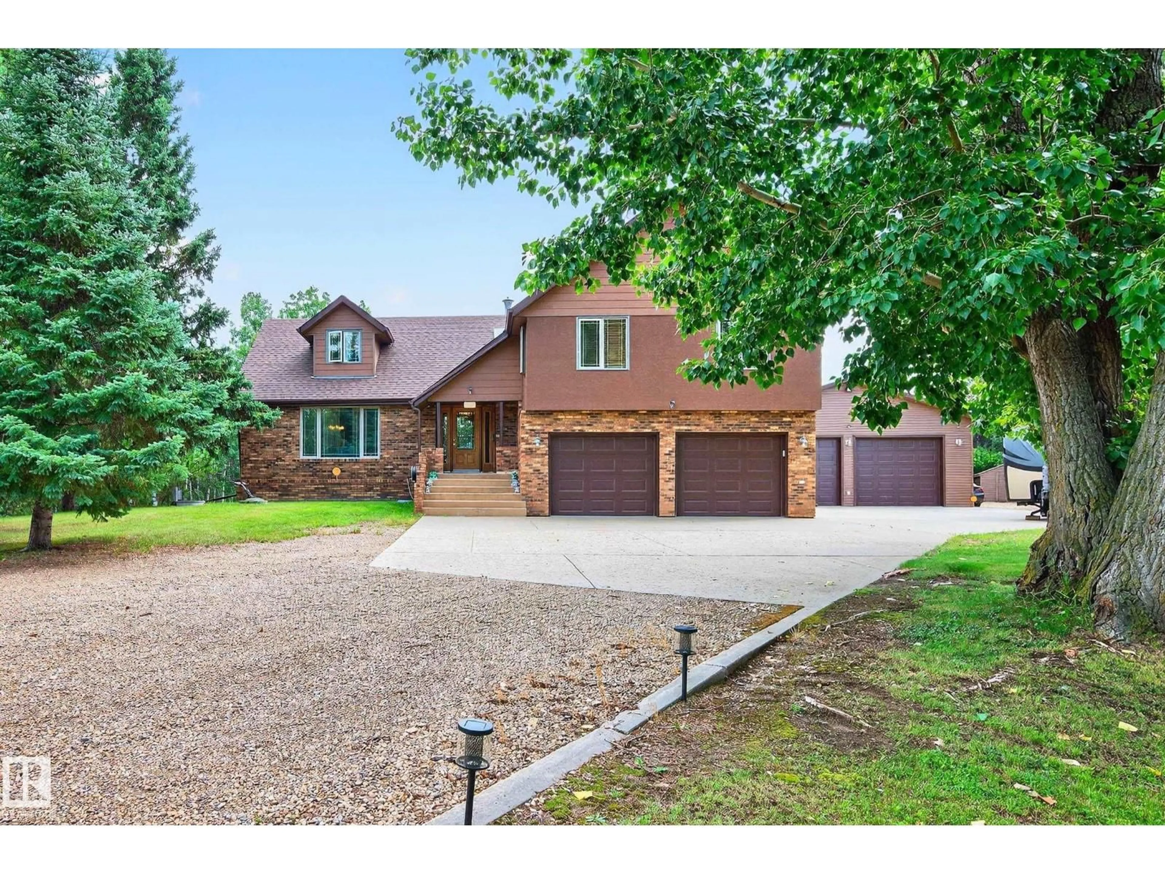 Home with brick exterior material, street for 55 473084 RGE ROAD 242, Rural Wetaskiwin County Alberta T0C1Z0