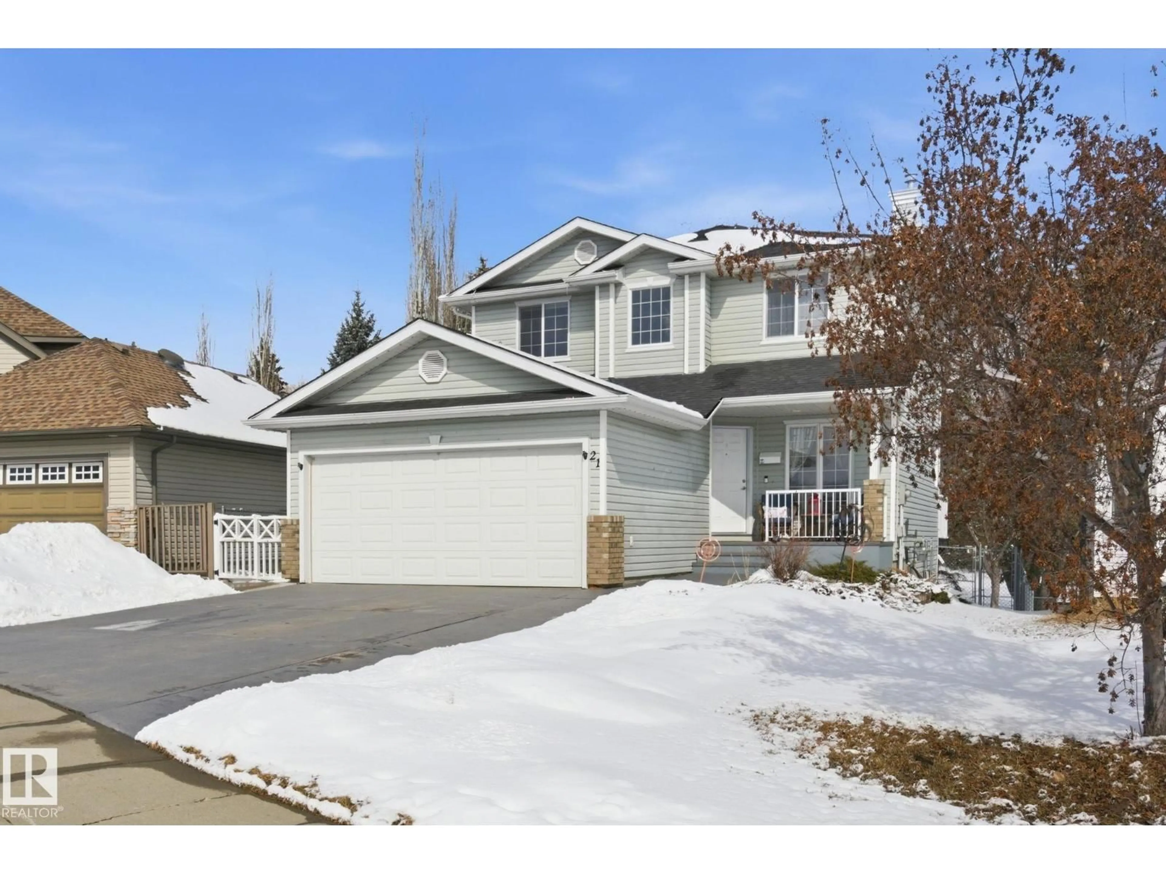 Home with vinyl exterior material, street for 21 BELFRY FAIRWAY CR, Stony Plain Alberta T7Z2M8
