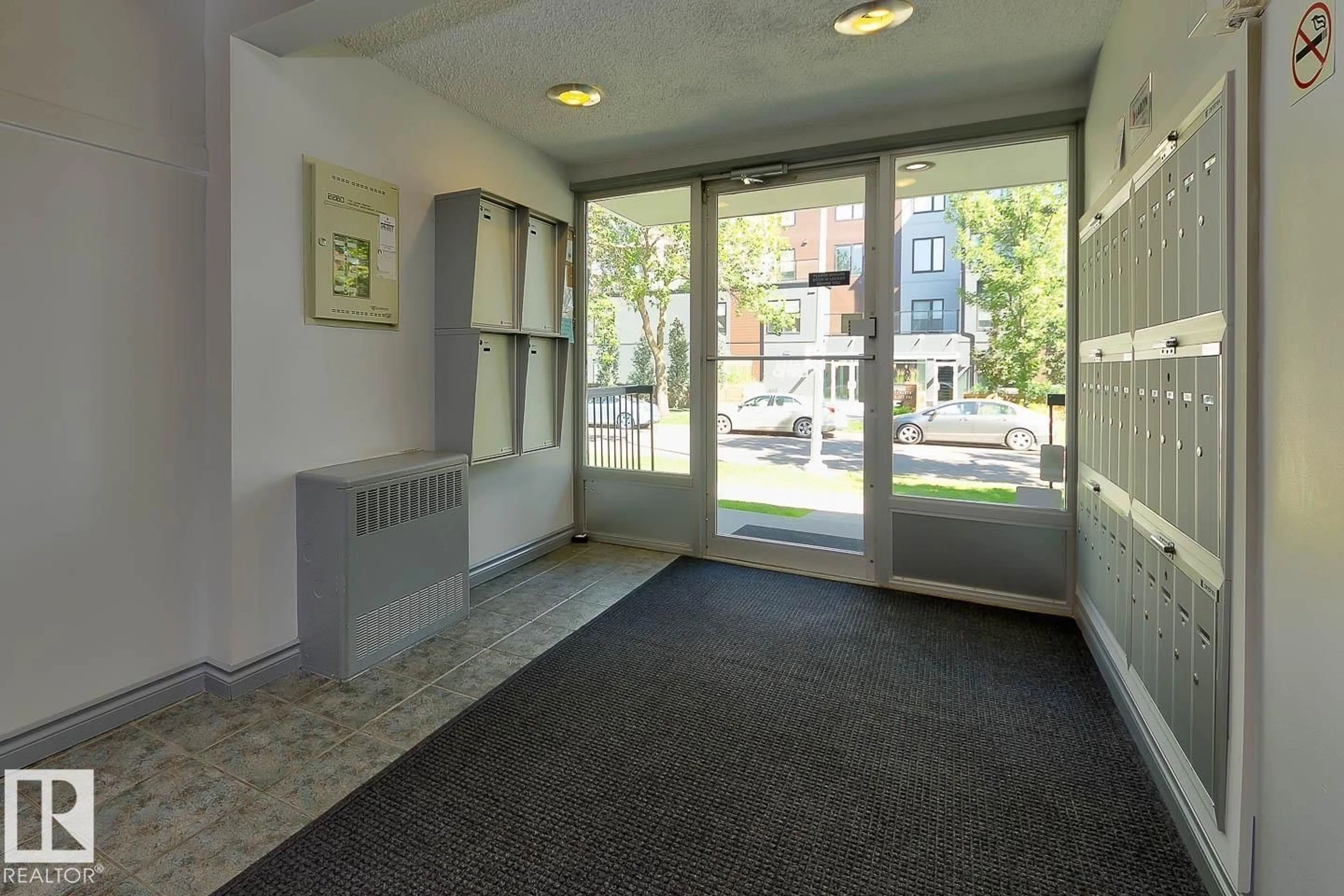 Indoor foyer for #102 - 11217 103 AV, Edmonton Alberta T5K2V9