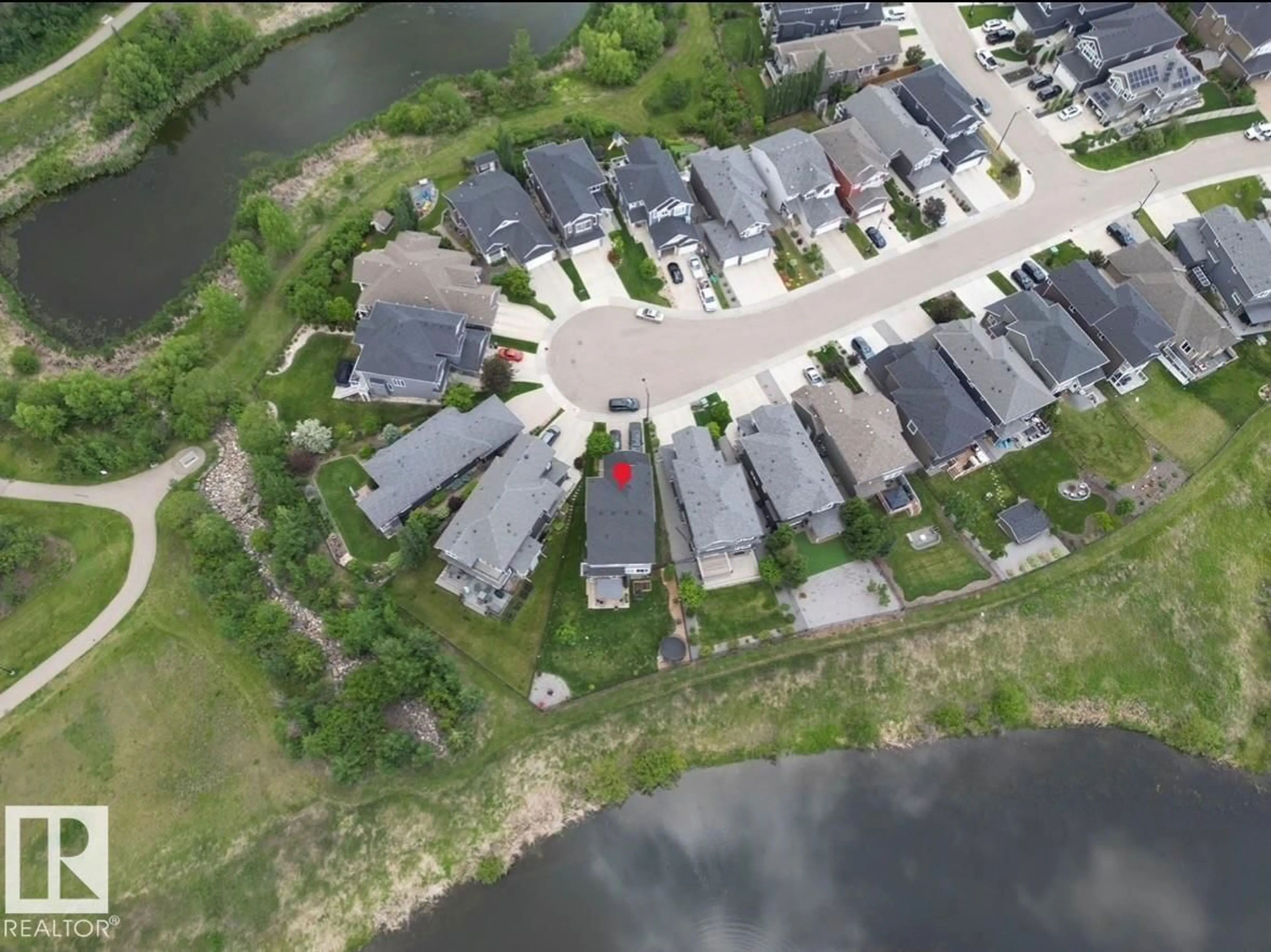 A pic from outside/outdoor area/front of a property/back of a property/a pic from drone, water/lake/river/ocean view for 2133 BLUE JAY PT, Edmonton Alberta T5S0H9