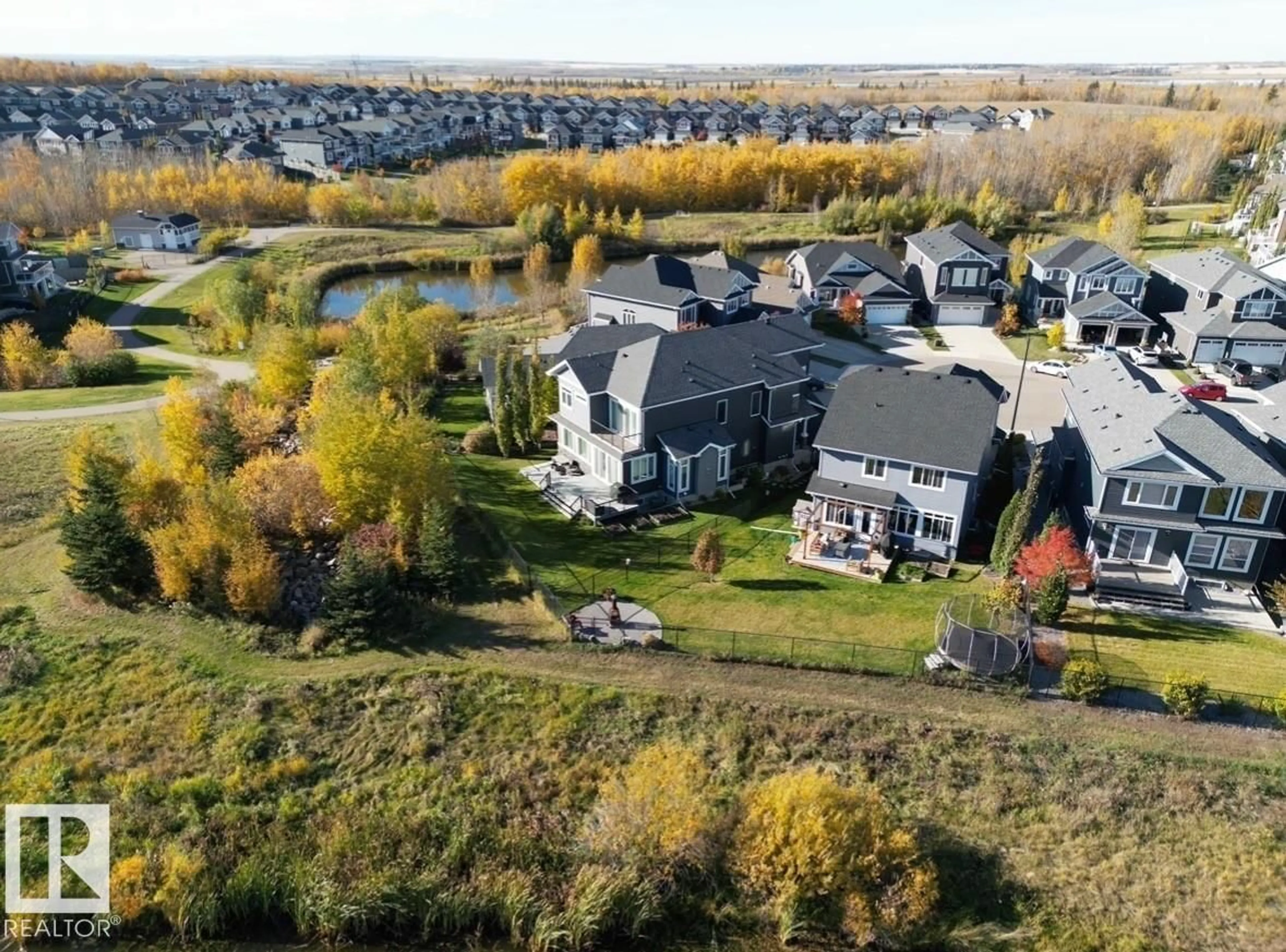 A pic from outside/outdoor area/front of a property/back of a property/a pic from drone, water/lake/river/ocean view for 2133 BLUE JAY PT, Edmonton Alberta T5S0H9