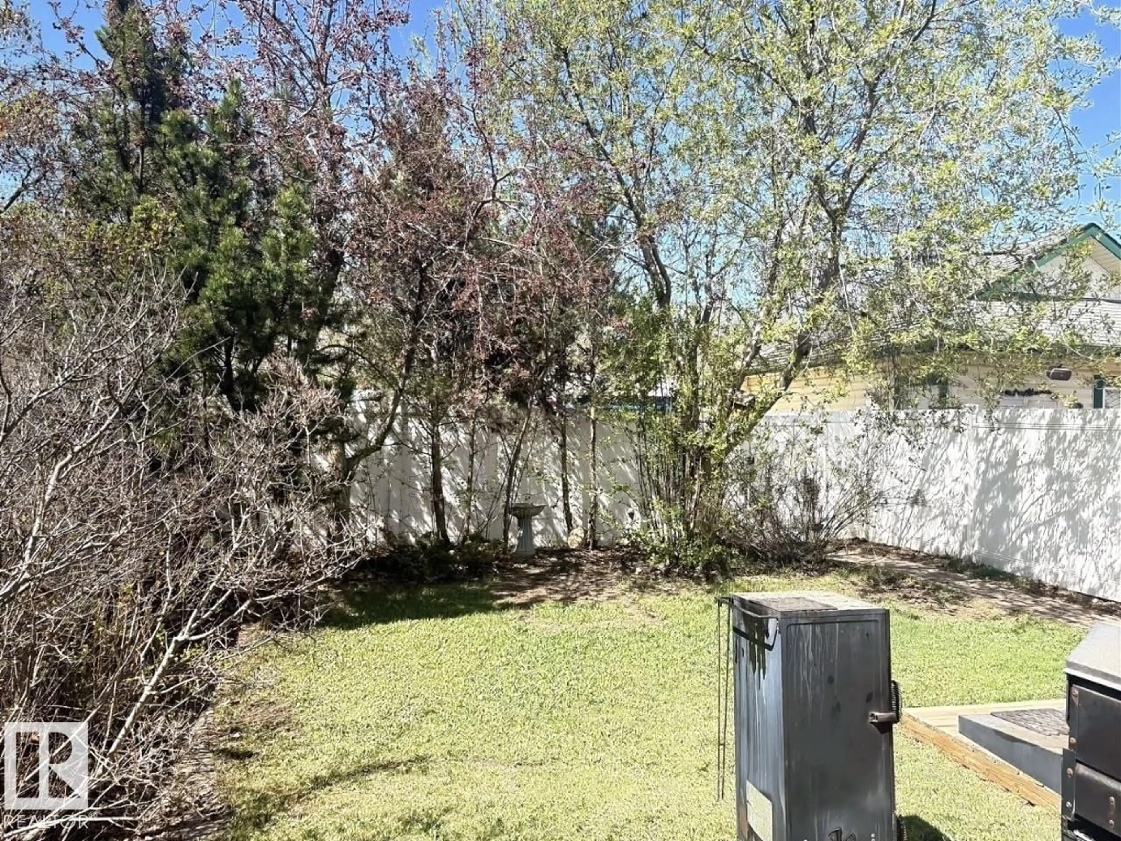 A pic from outside/outdoor area/front of a property/back of a property/a pic from drone, forest/trees view for NW - 1712 TURVEY BN, Edmonton Alberta T6R2W7