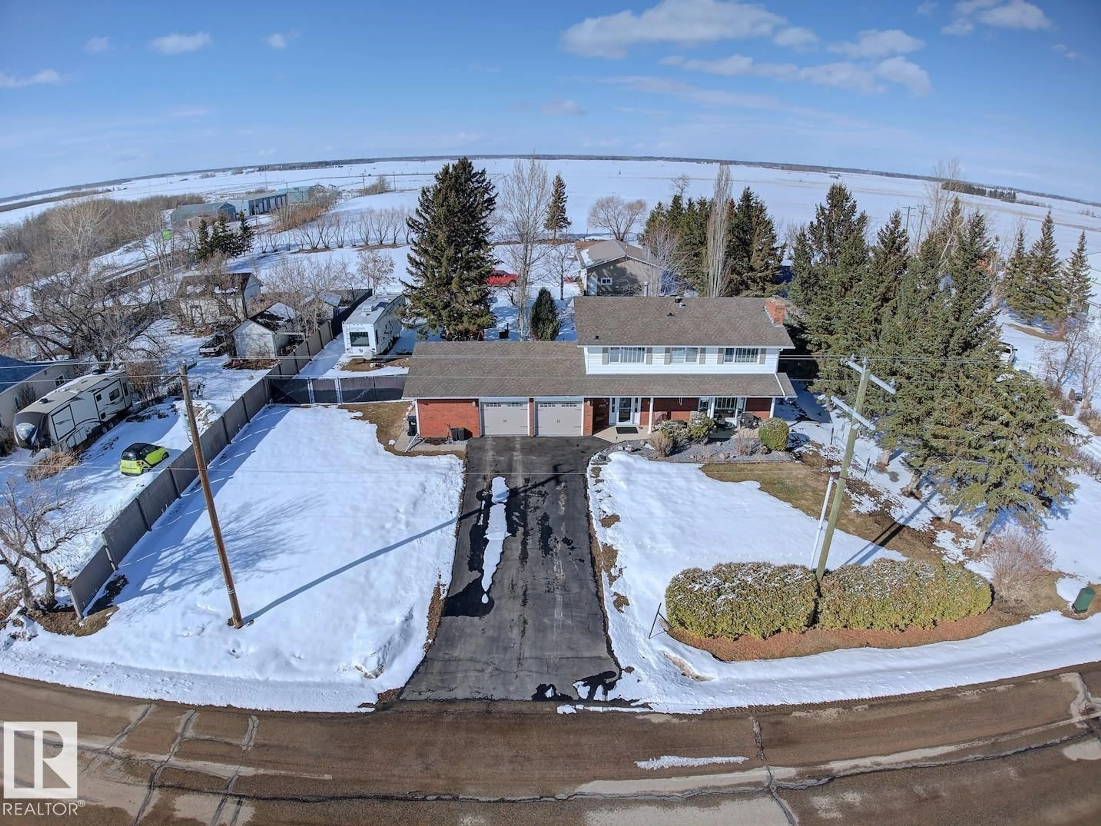 A pic from outside/outdoor area/front of a property/back of a property/a pic from drone, unknown for 5308 52 AV, Bruderheim Alberta T0B0S0