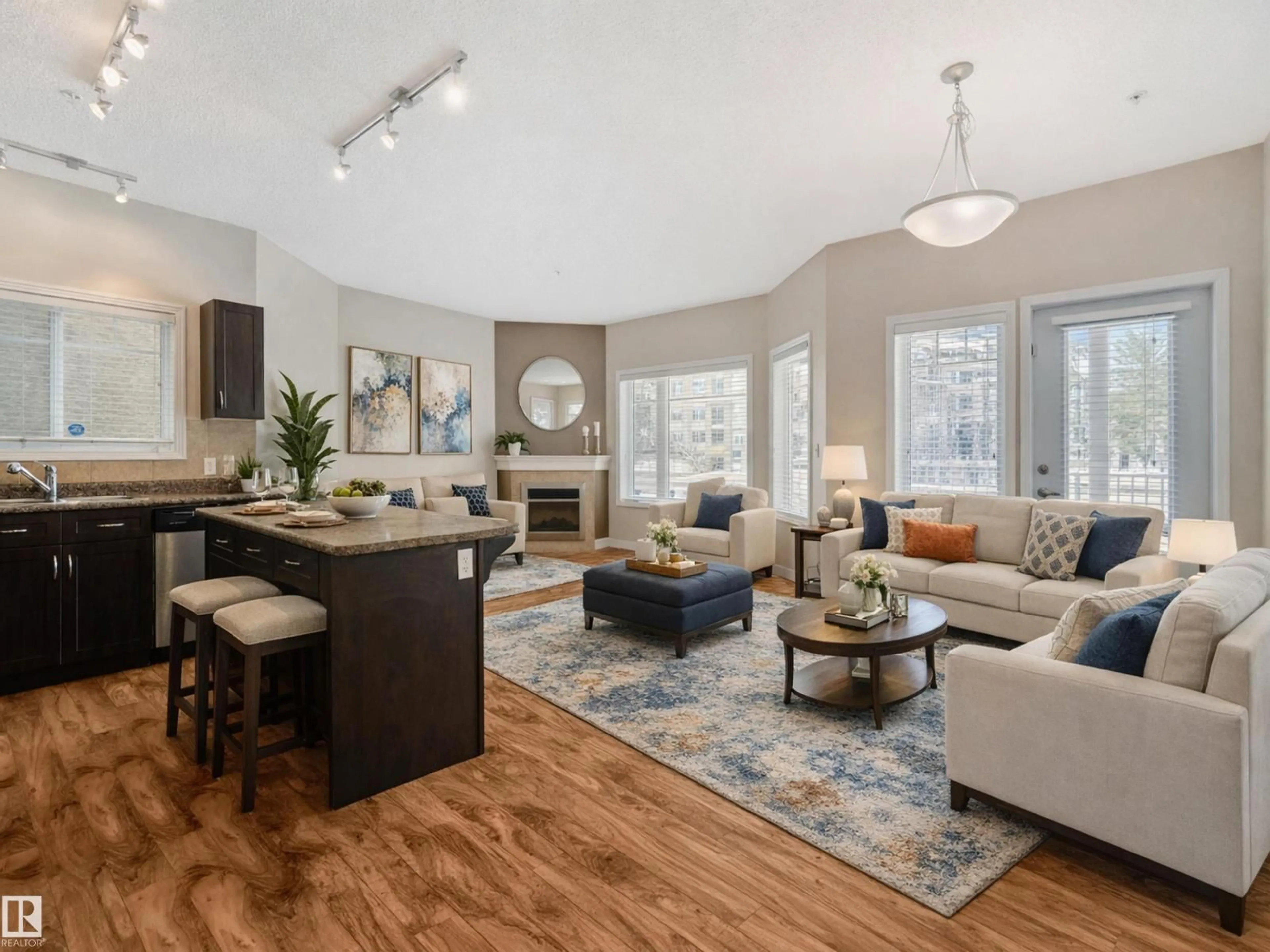 Living room with furniture, wood/laminate floor for #120 - 8931 156 ST, Edmonton Alberta T5R1Y6