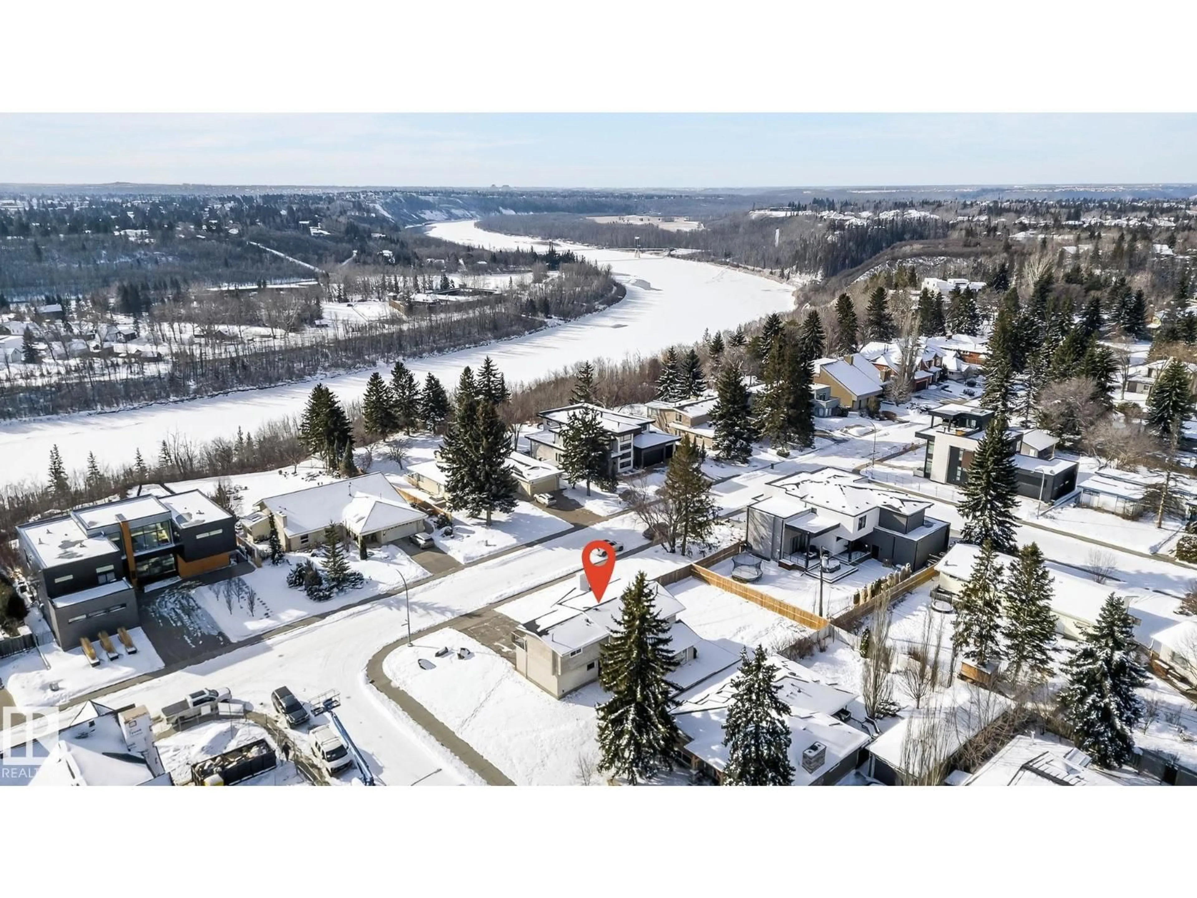A pic from outside/outdoor area/front of a property/back of a property/a pic from drone, water/lake/river/ocean view for 15404 RIO TERRACE DR, Edmonton Alberta T5R5M7