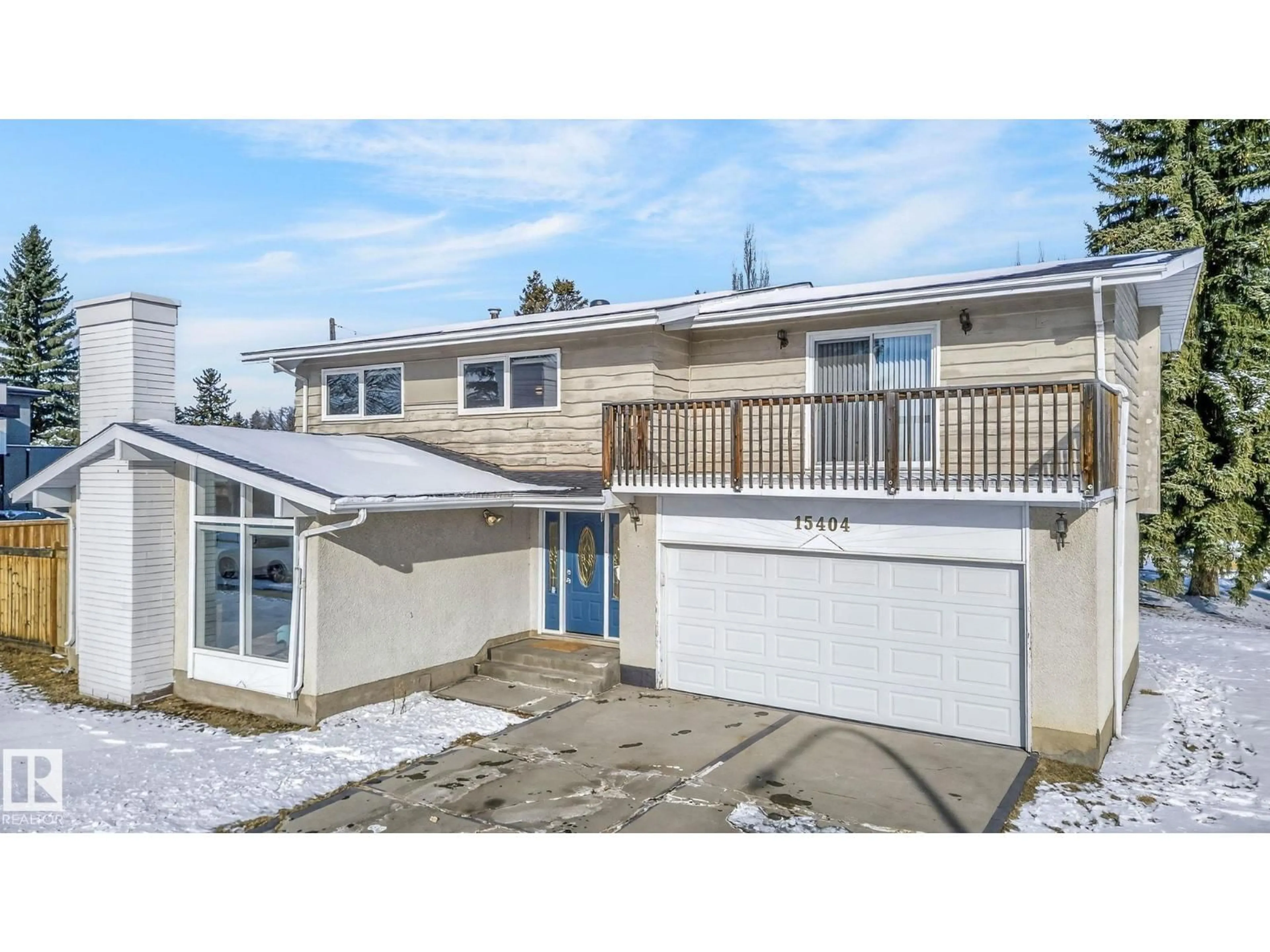 Home with vinyl exterior material, street for 15404 RIO TERRACE DR, Edmonton Alberta T5R5M7