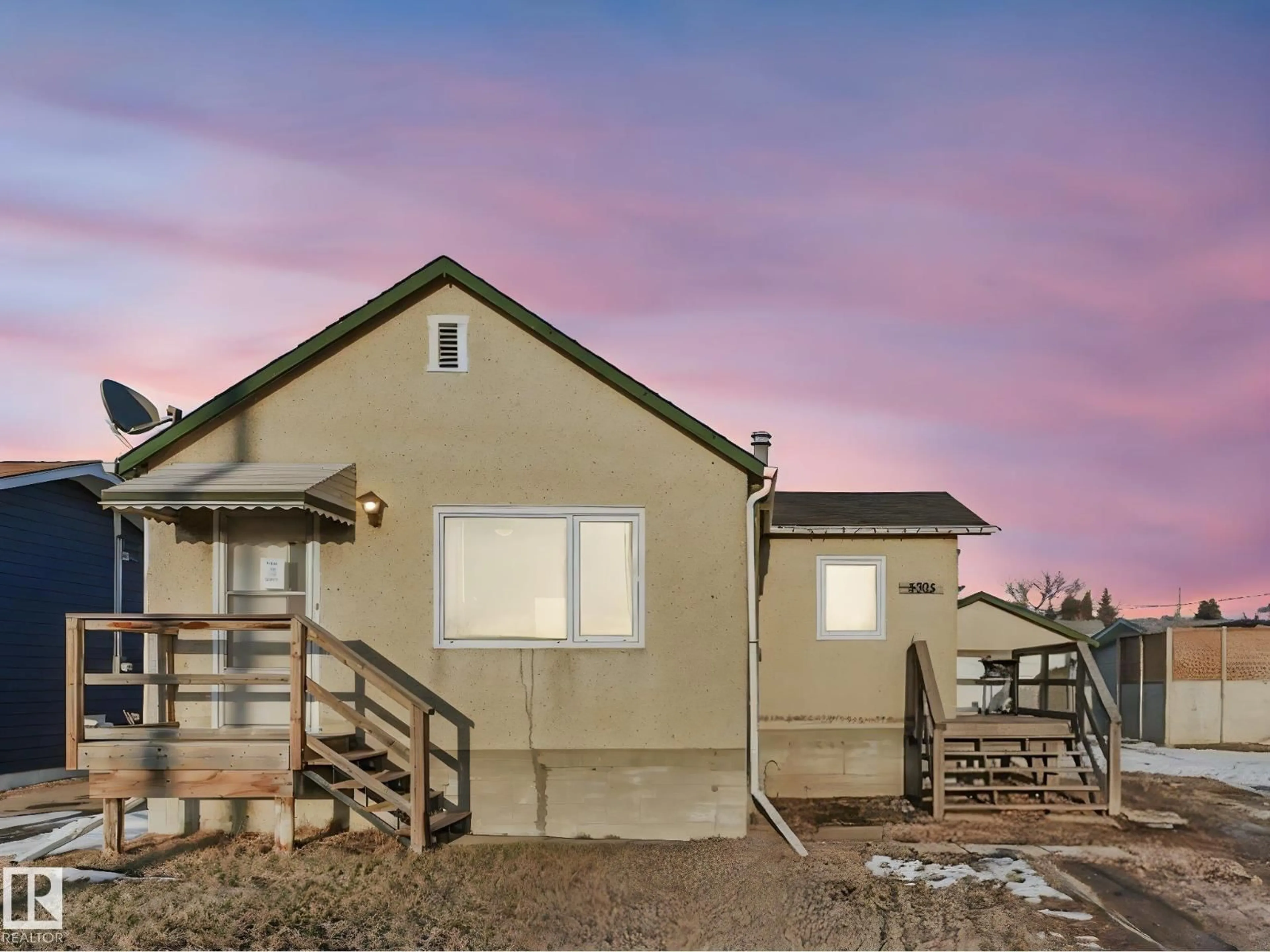 Home with vinyl exterior material, street for 5305 46 ST, Leduc Alberta T9E5W2