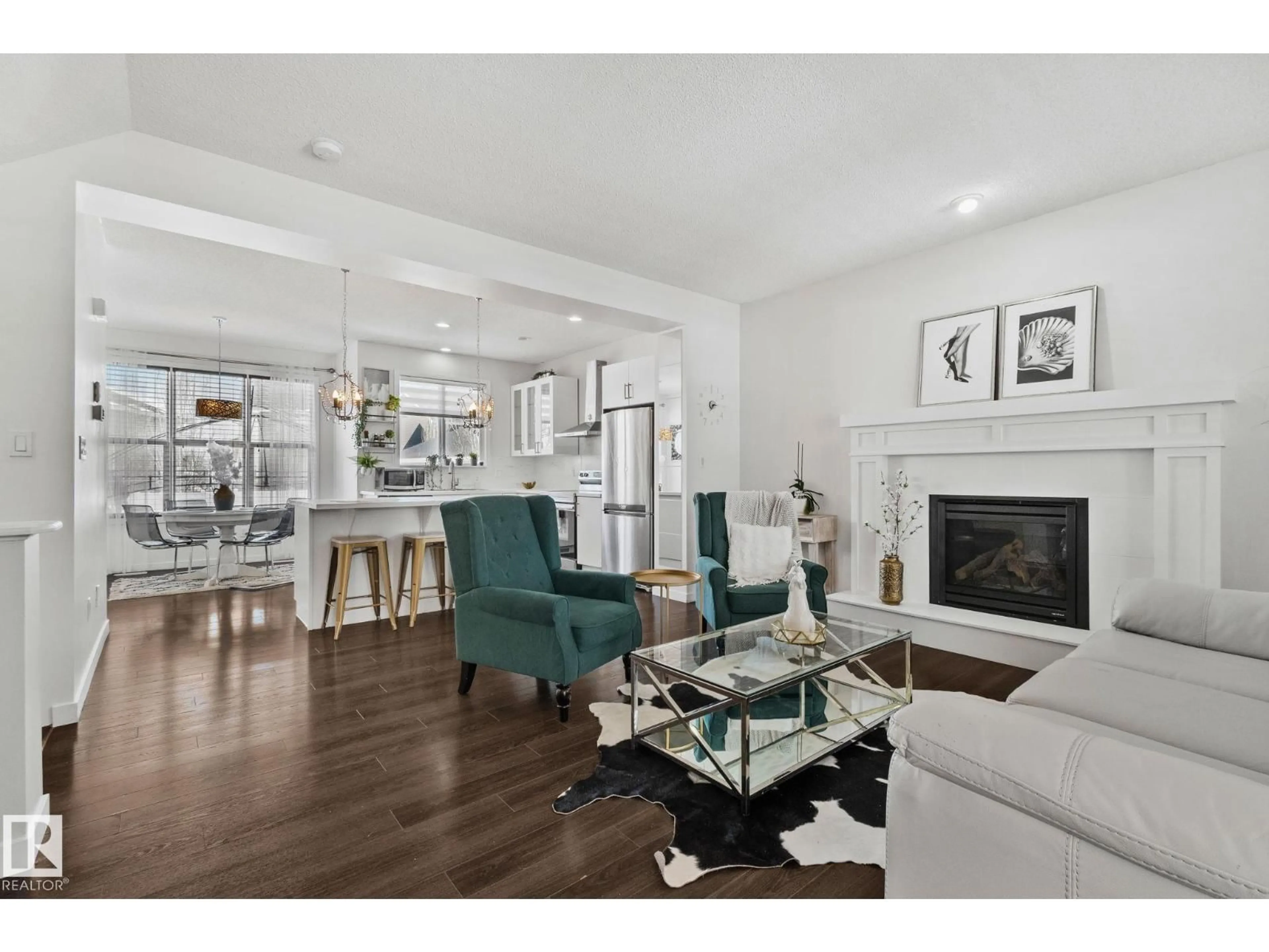 Living room with furniture, wood/laminate floor for 336 SOUTHFORK DR, Leduc Alberta T9E0E6