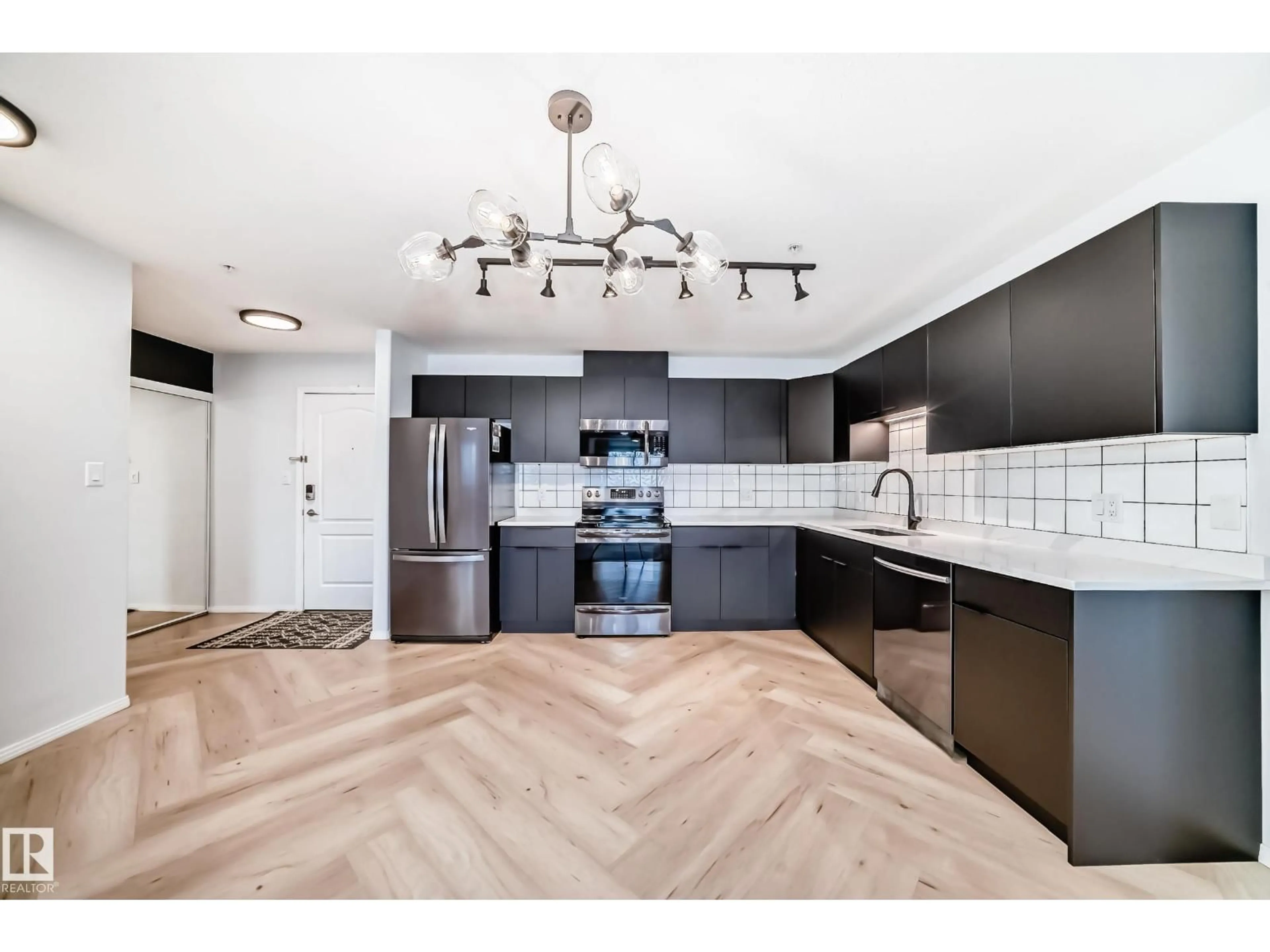 Open concept kitchen, unknown for #320 - 592 HOOKE RD, Edmonton Alberta T5A5H2
