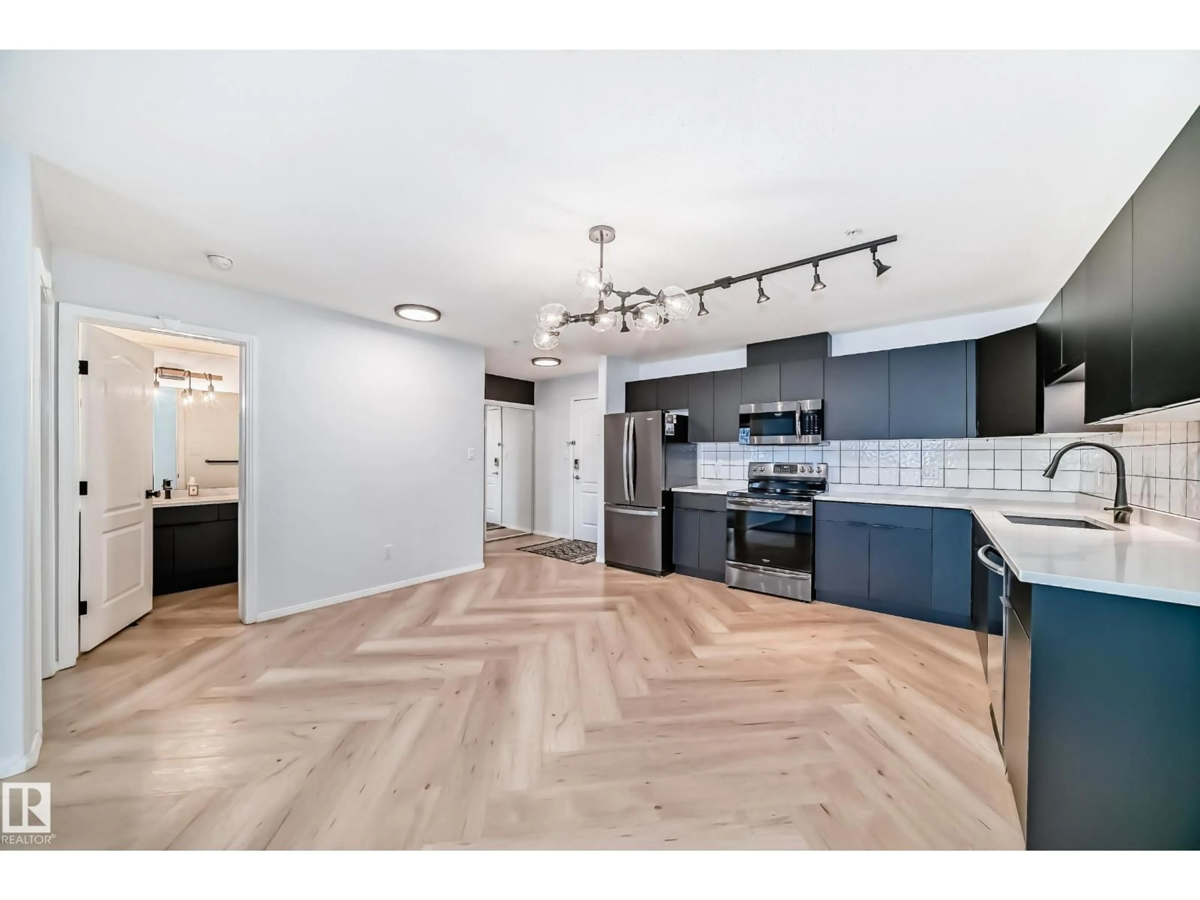 Open concept kitchen, unknown for #320 - 592 HOOKE RD, Edmonton Alberta T5A5H2