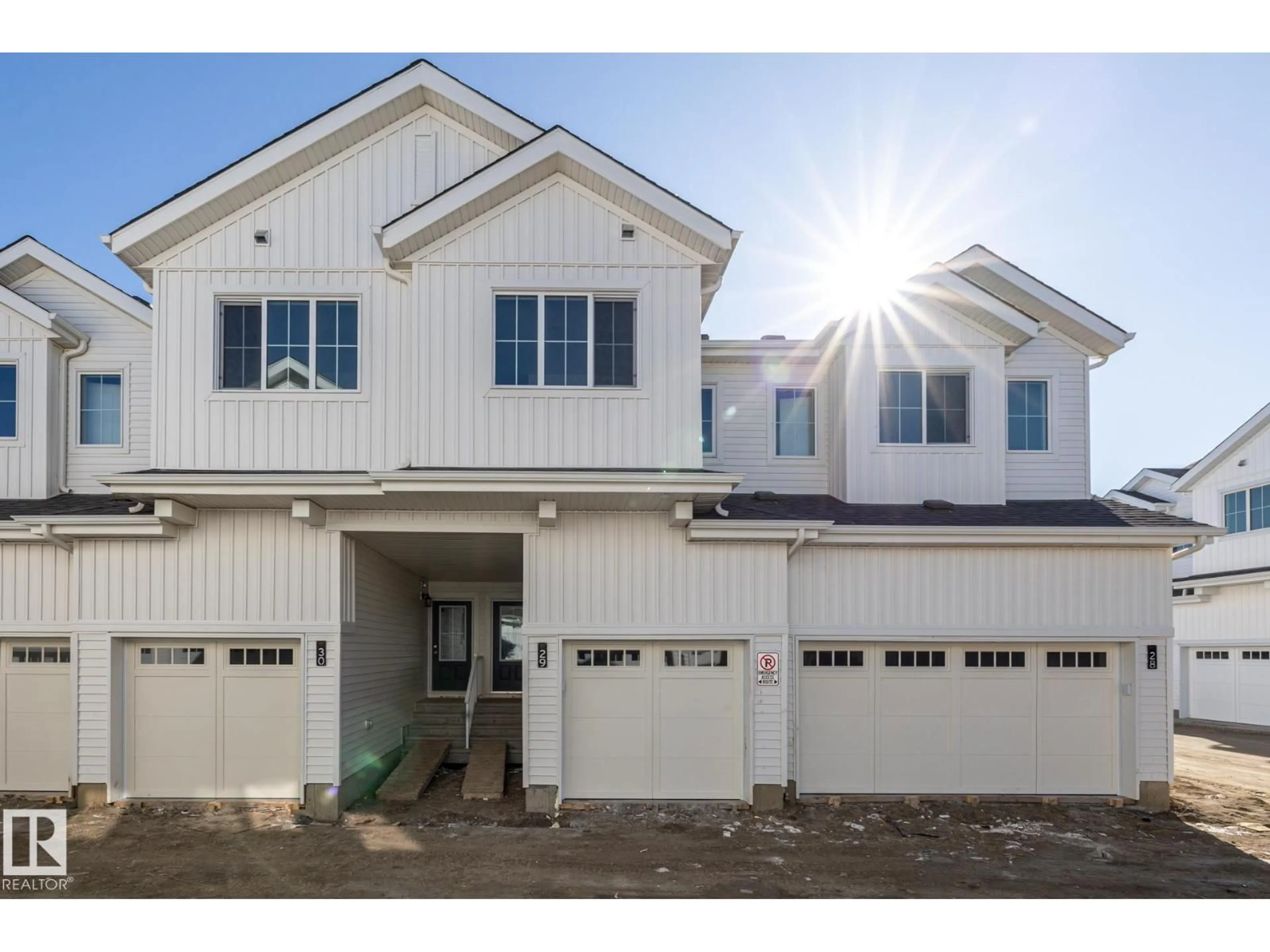 Home with vinyl exterior material, street for 7110 - 29 KESWICK CM, Edmonton Alberta T6W5P7