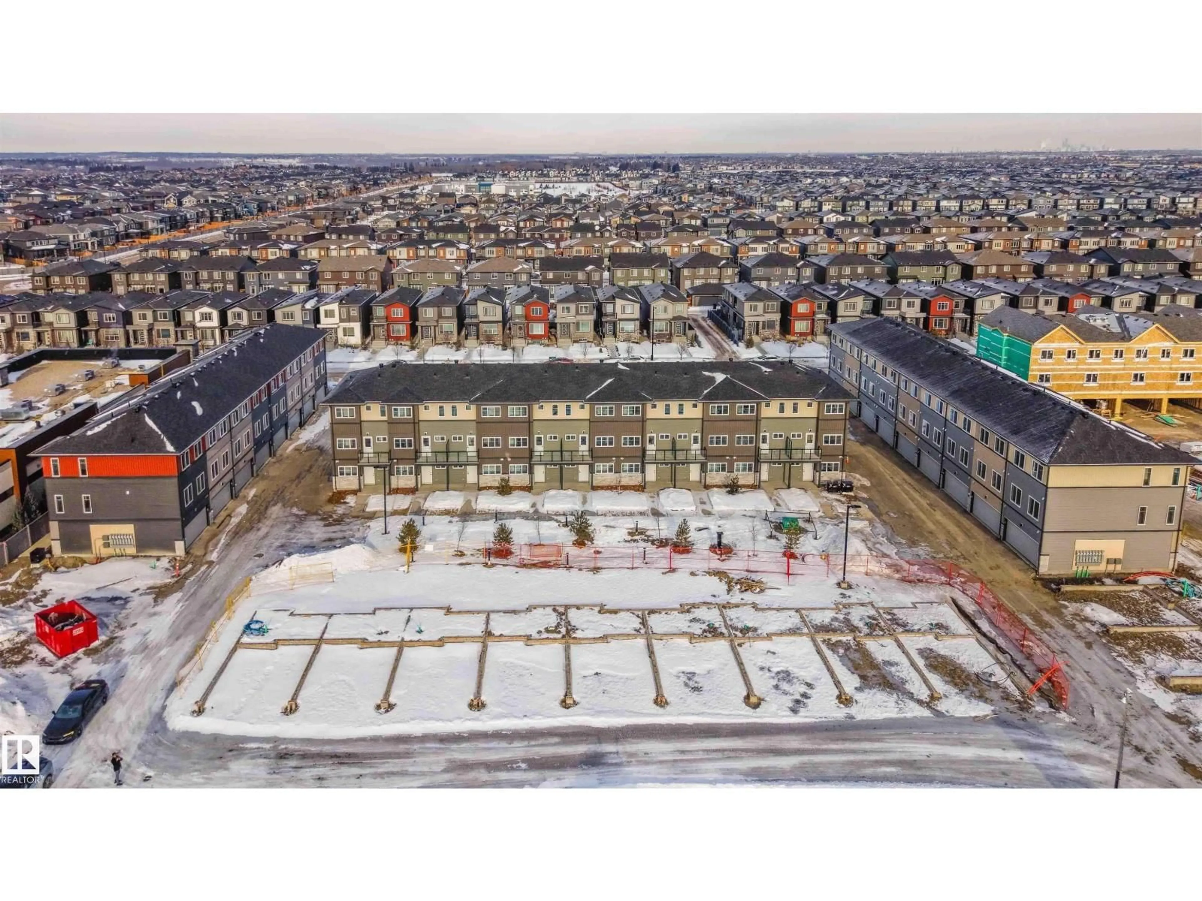A pic from outside/outdoor area/front of a property/back of a property/a pic from drone, unknown for 48 18120 28 AV SW, Edmonton Alberta T6W4V2