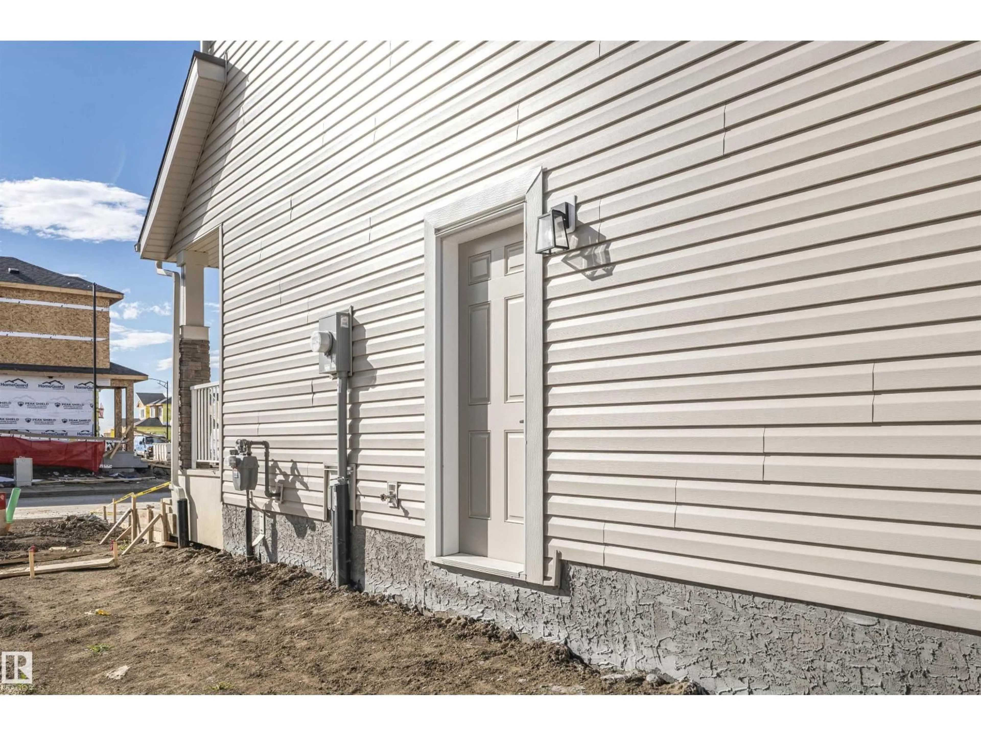 Home with vinyl exterior material, building for 20818 15A AV, Edmonton Alberta T6M1K7