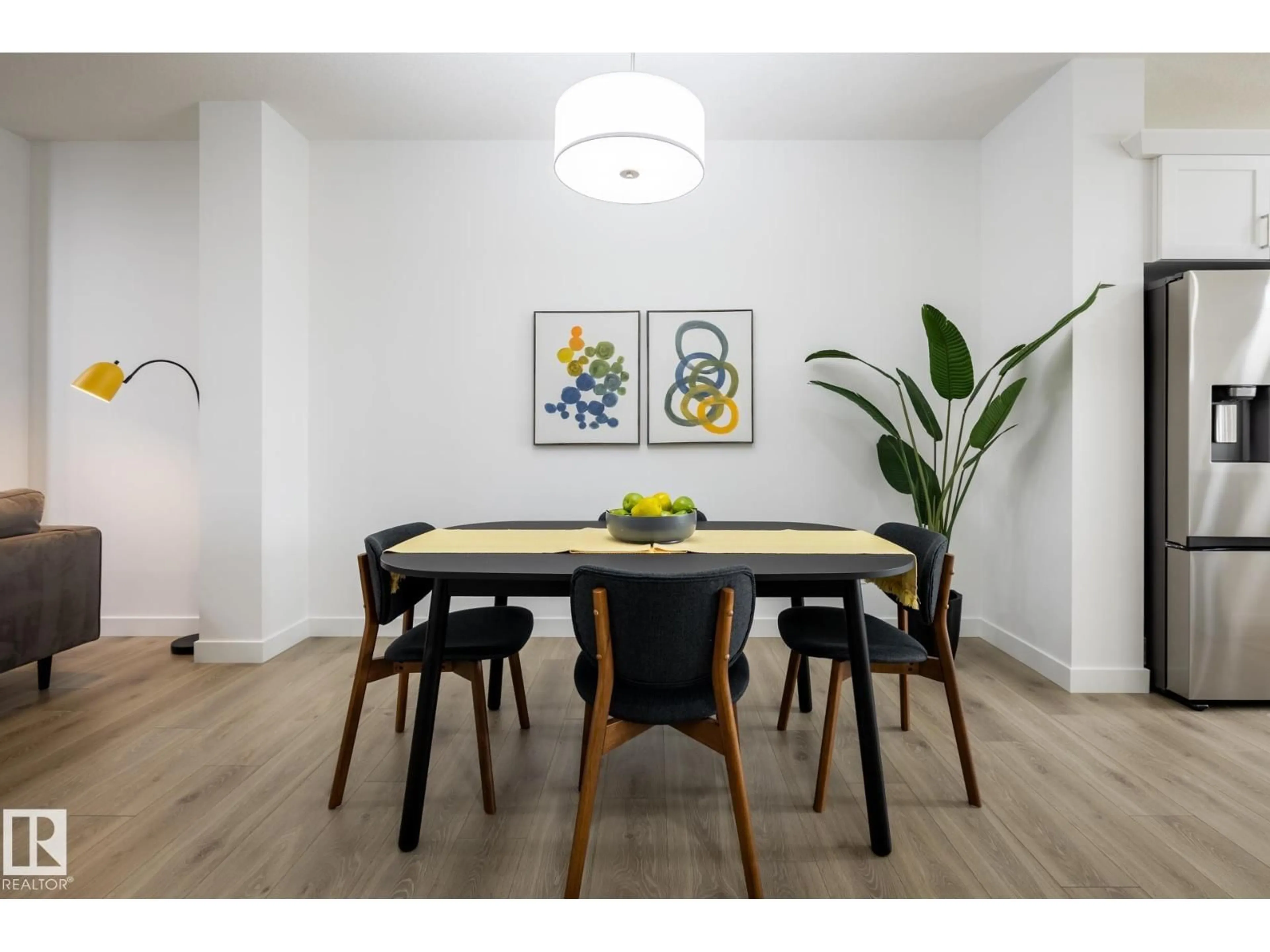 Dining room, wood/laminate floor for 20818 15A AV, Edmonton Alberta T6M1K7