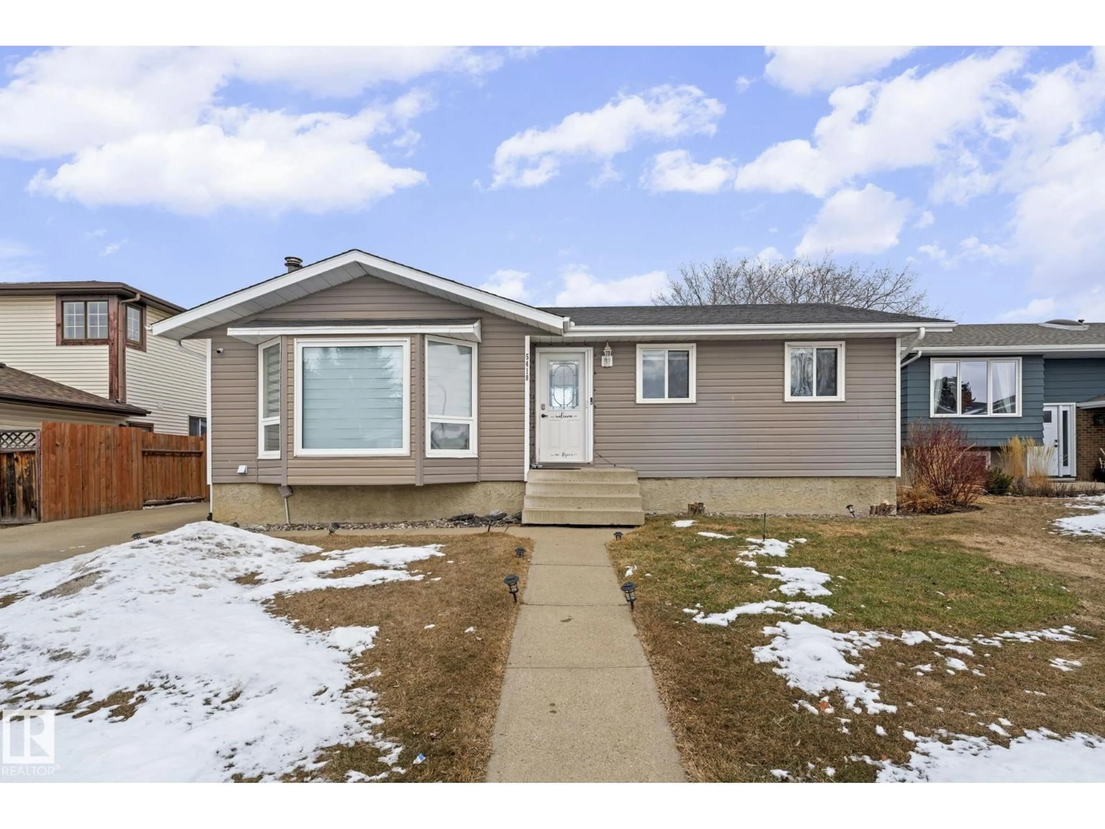 Home with vinyl exterior material, street for 5418 17A AV, Edmonton Alberta T6L1L2