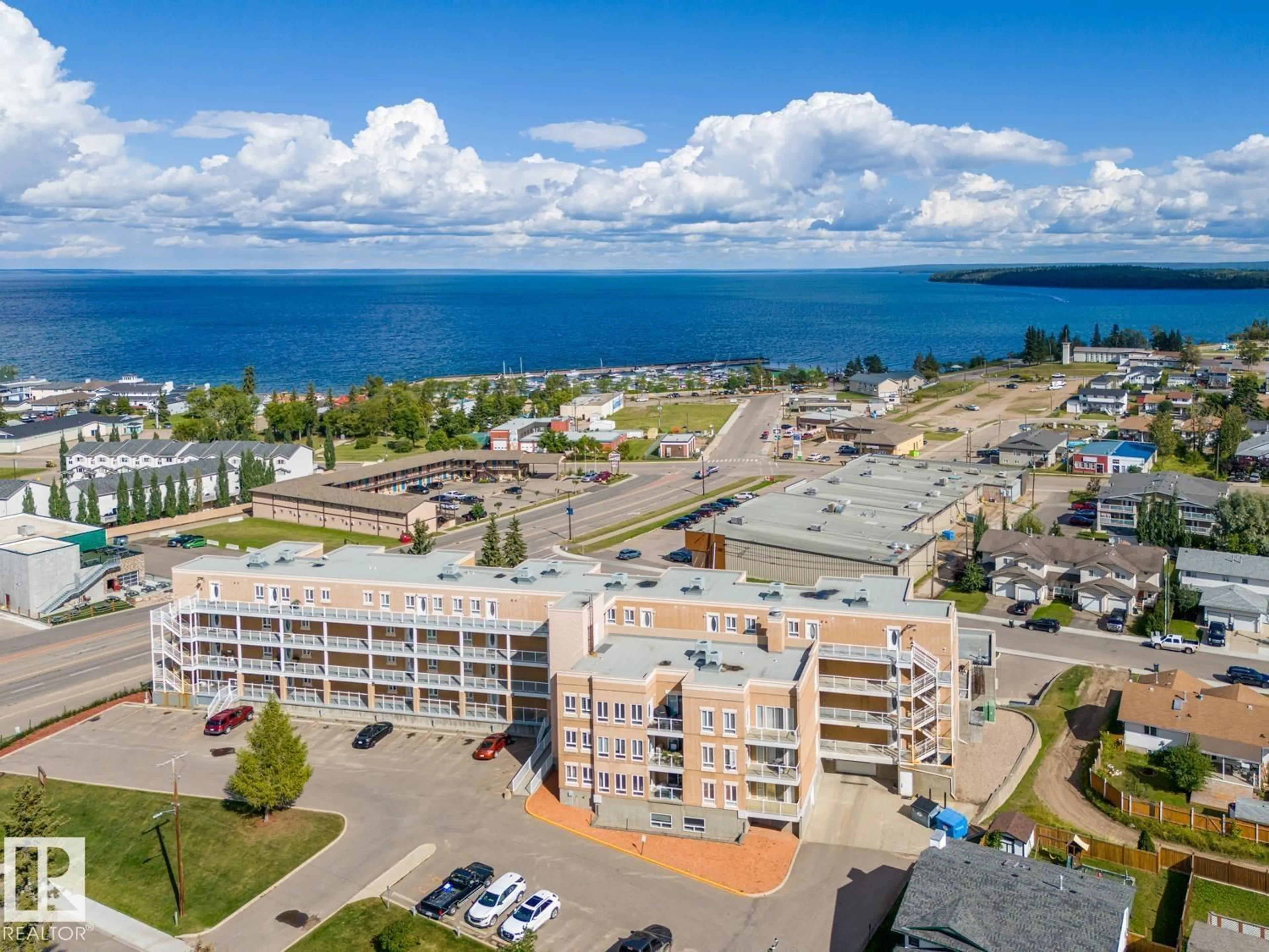 A pic from outside/outdoor area/front of a property/back of a property/a pic from drone, water/lake/river/ocean view for 107 - 801 11 ST, Cold Lake Alberta T9M1H5