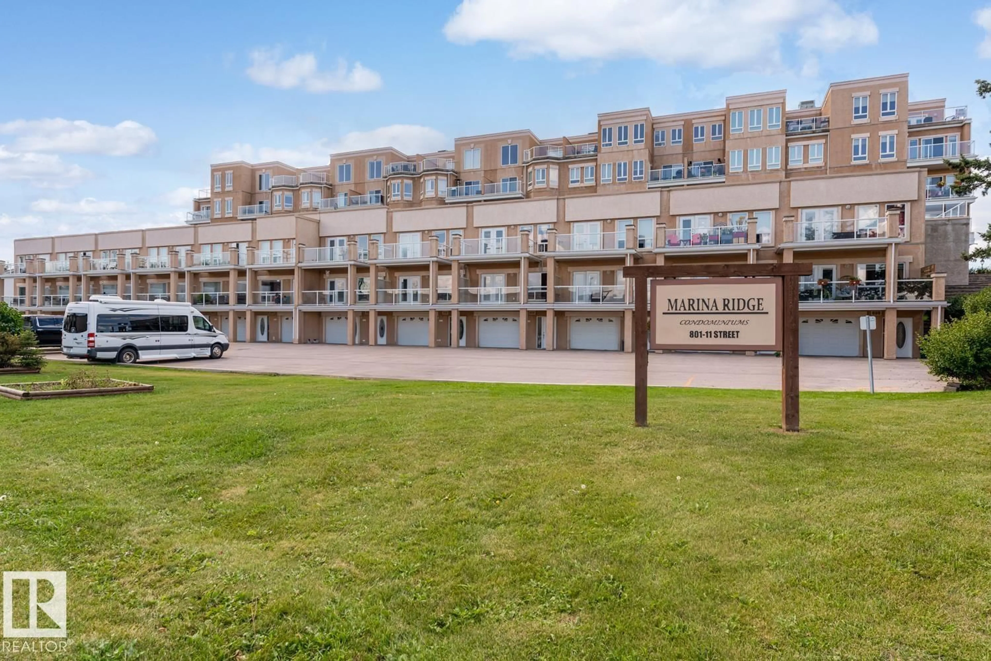 A pic from outside/outdoor area/front of a property/back of a property/a pic from drone, building for 107 - 801 11 ST, Cold Lake Alberta T9M1H5