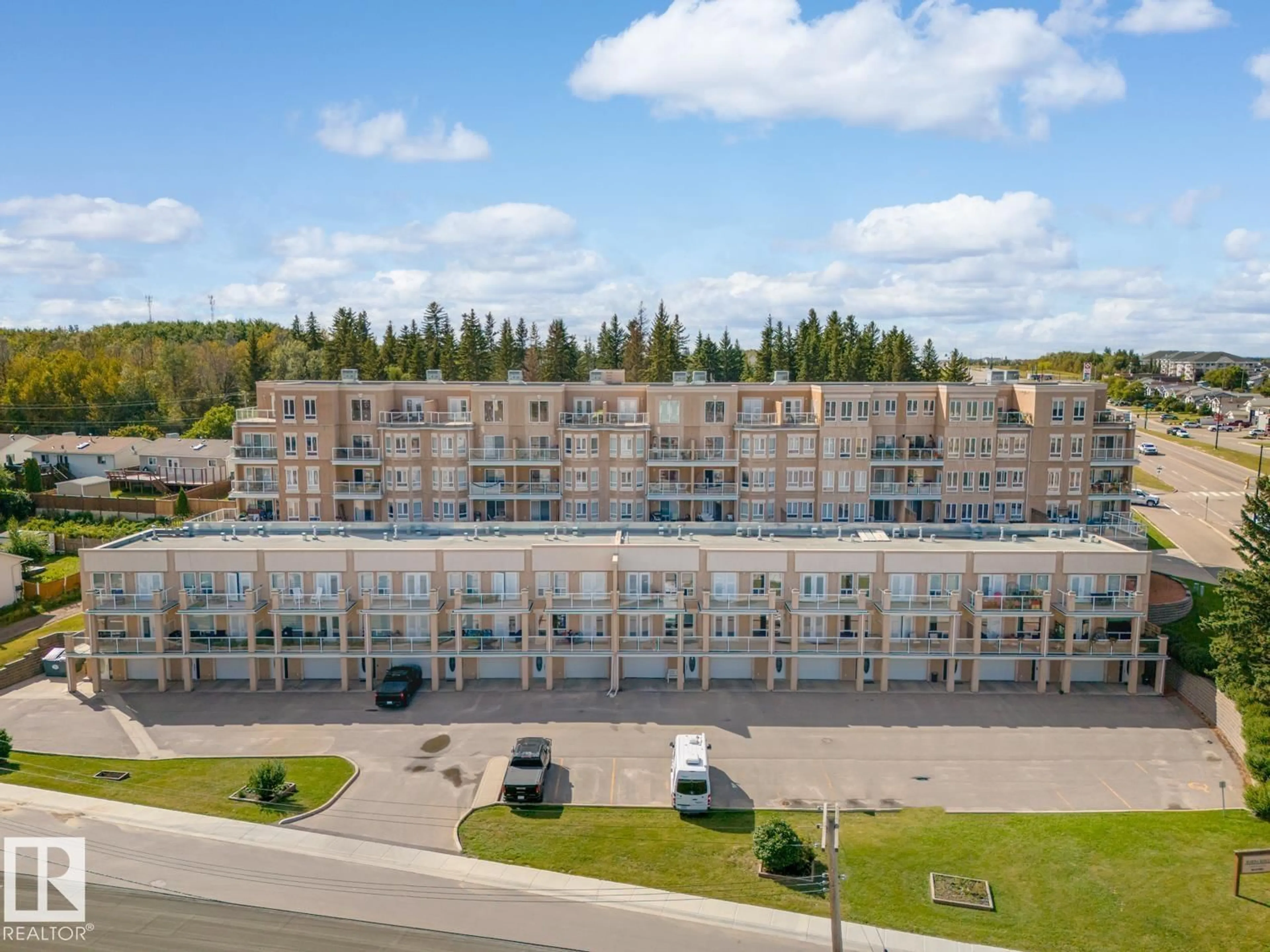A pic from outside/outdoor area/front of a property/back of a property/a pic from drone, building for 107 - 801 11 ST, Cold Lake Alberta T9M1H5