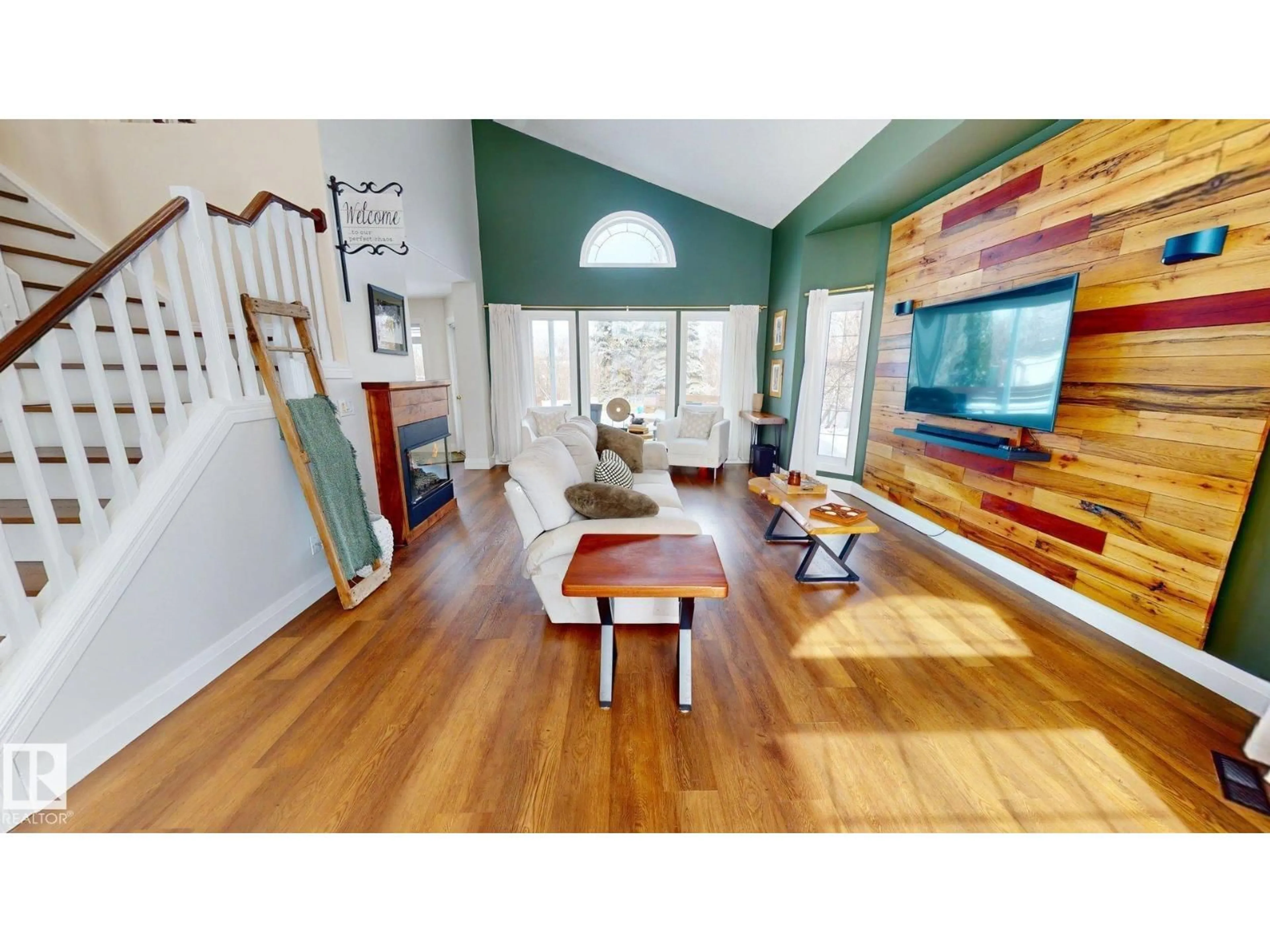 Living room with furniture, wood/laminate floor for 458 RIVERPARK DR, Fort Saskatchewan Alberta T8L3X3