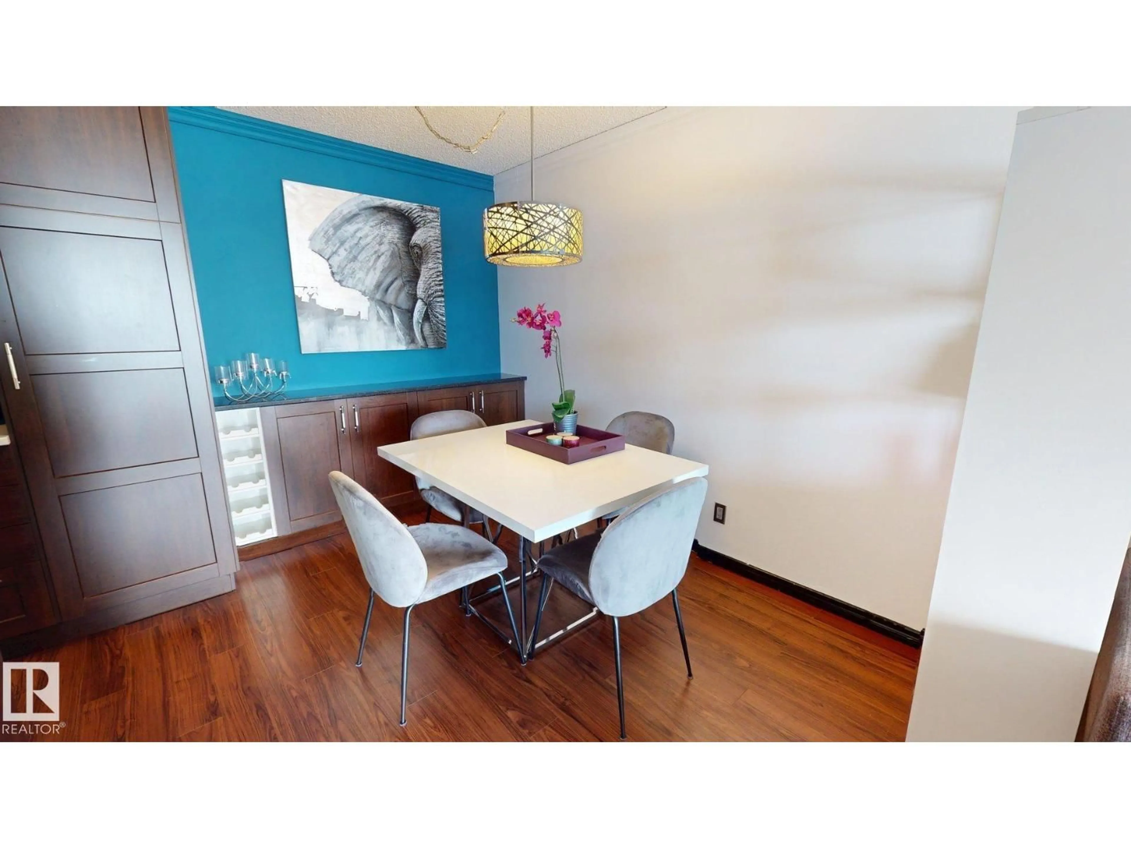 Dining room, wood/laminate floor for 421 10511 19 AV NW, Edmonton Alberta T6J5S8
