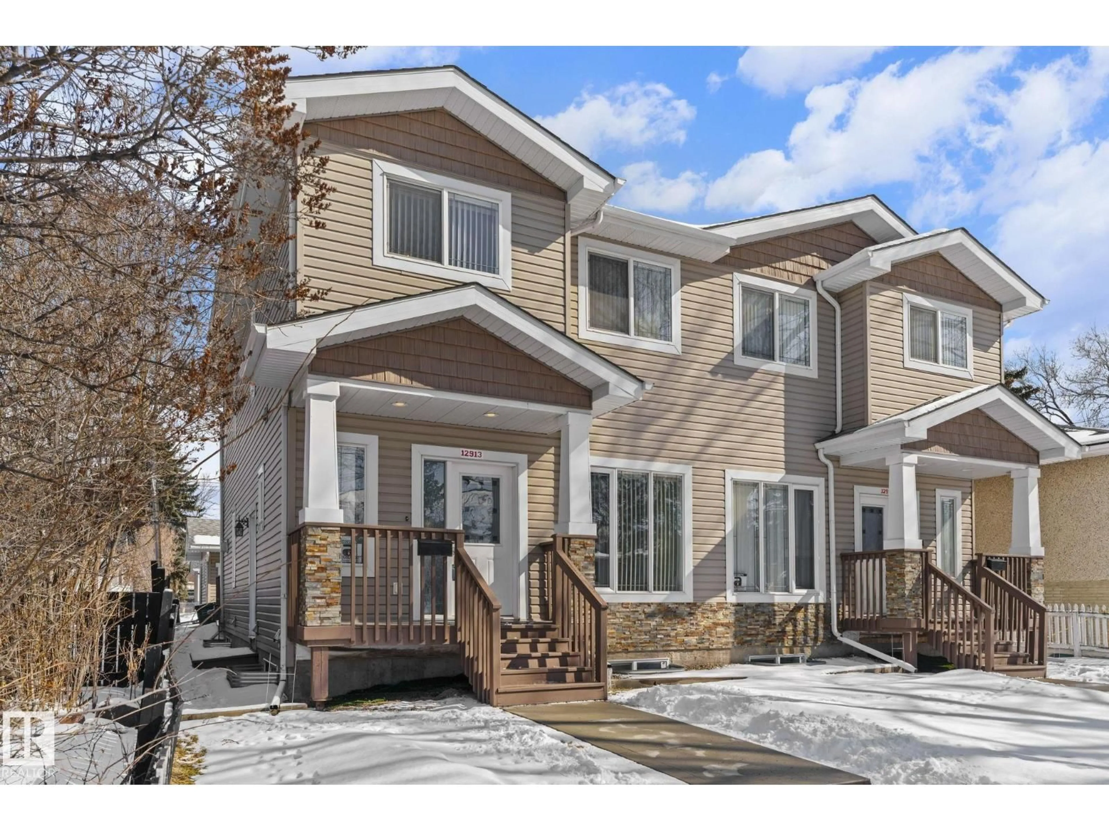 Home with vinyl exterior material, street for 12913 124 ST, Edmonton Alberta T5L0P6