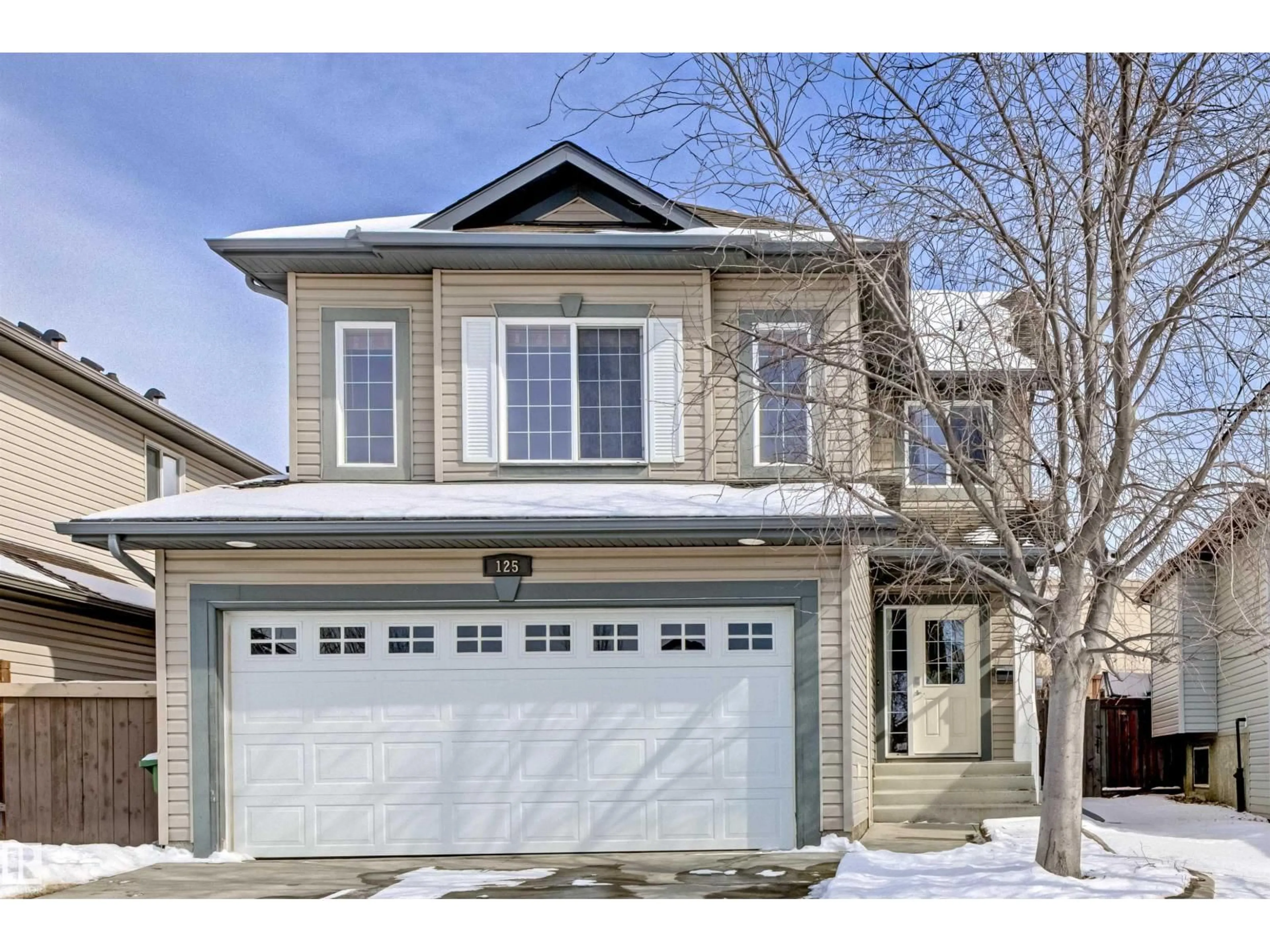 Home with vinyl exterior material, street for 125 RUE MASSON, Beaumont Alberta T4X1S8