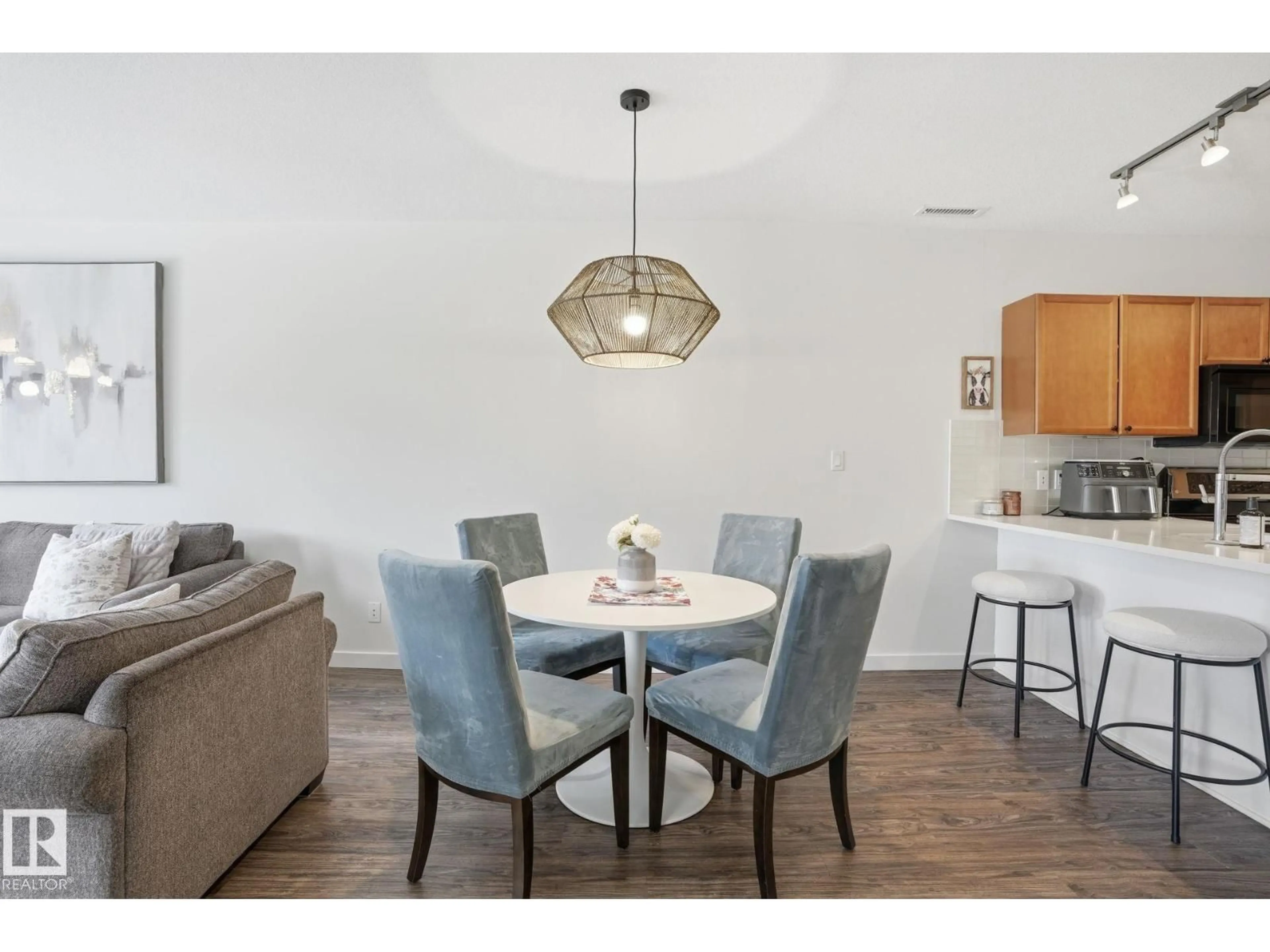 Dining room, wood/laminate floor for #212 - 501 PALISADES WY, Sherwood Park Alberta T8H0H8