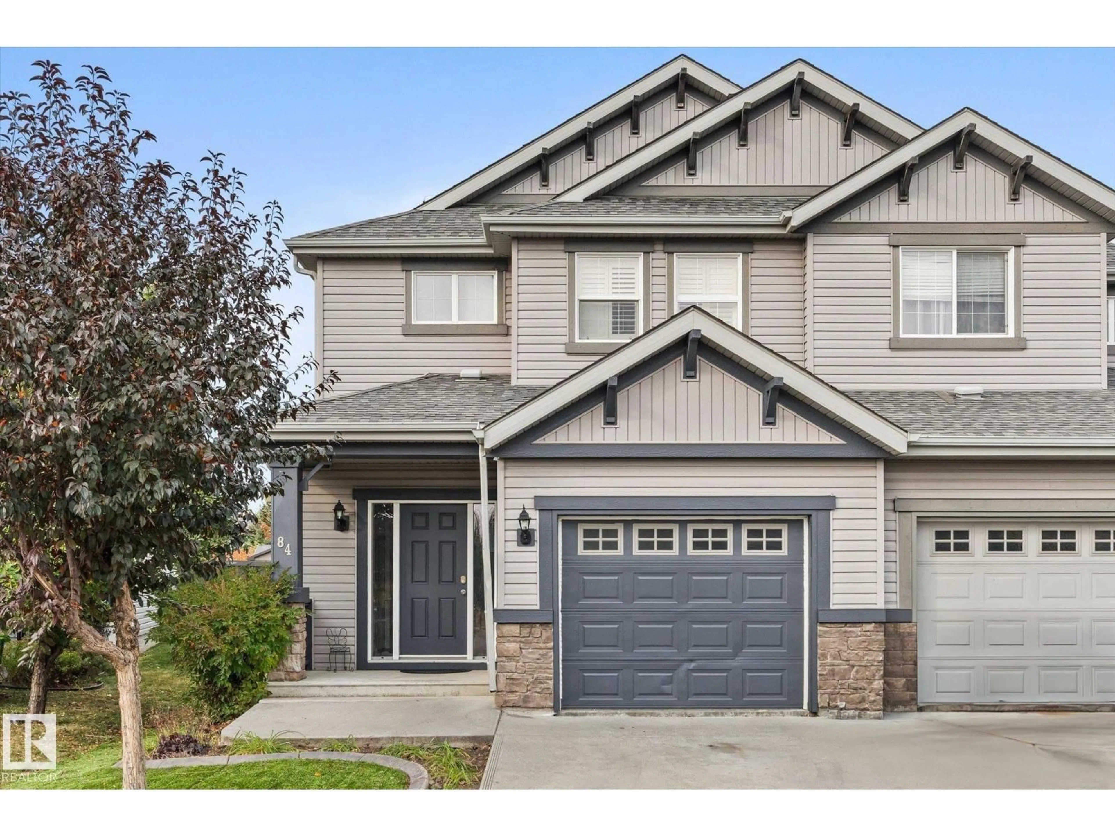 Home with vinyl exterior material, street for 84 CALVERT WD, Fort Saskatchewan Alberta T8L0C4