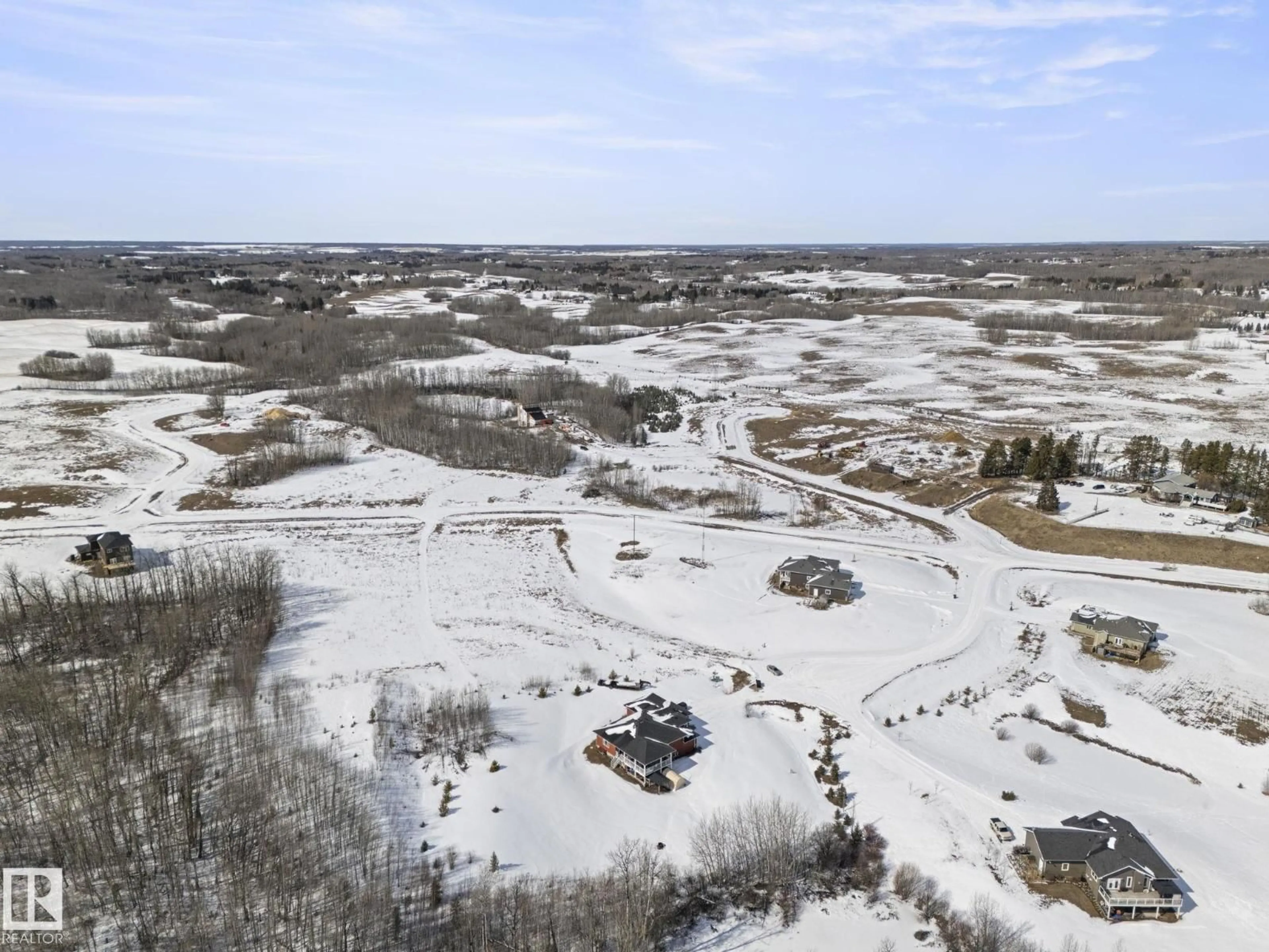 A pic from outside/outdoor area/front of a property/back of a property/a pic from drone, water/lake/river/ocean view for #7 - 53214 RGE ROAD 13, Rural Parkland County Alberta T7Y0C1