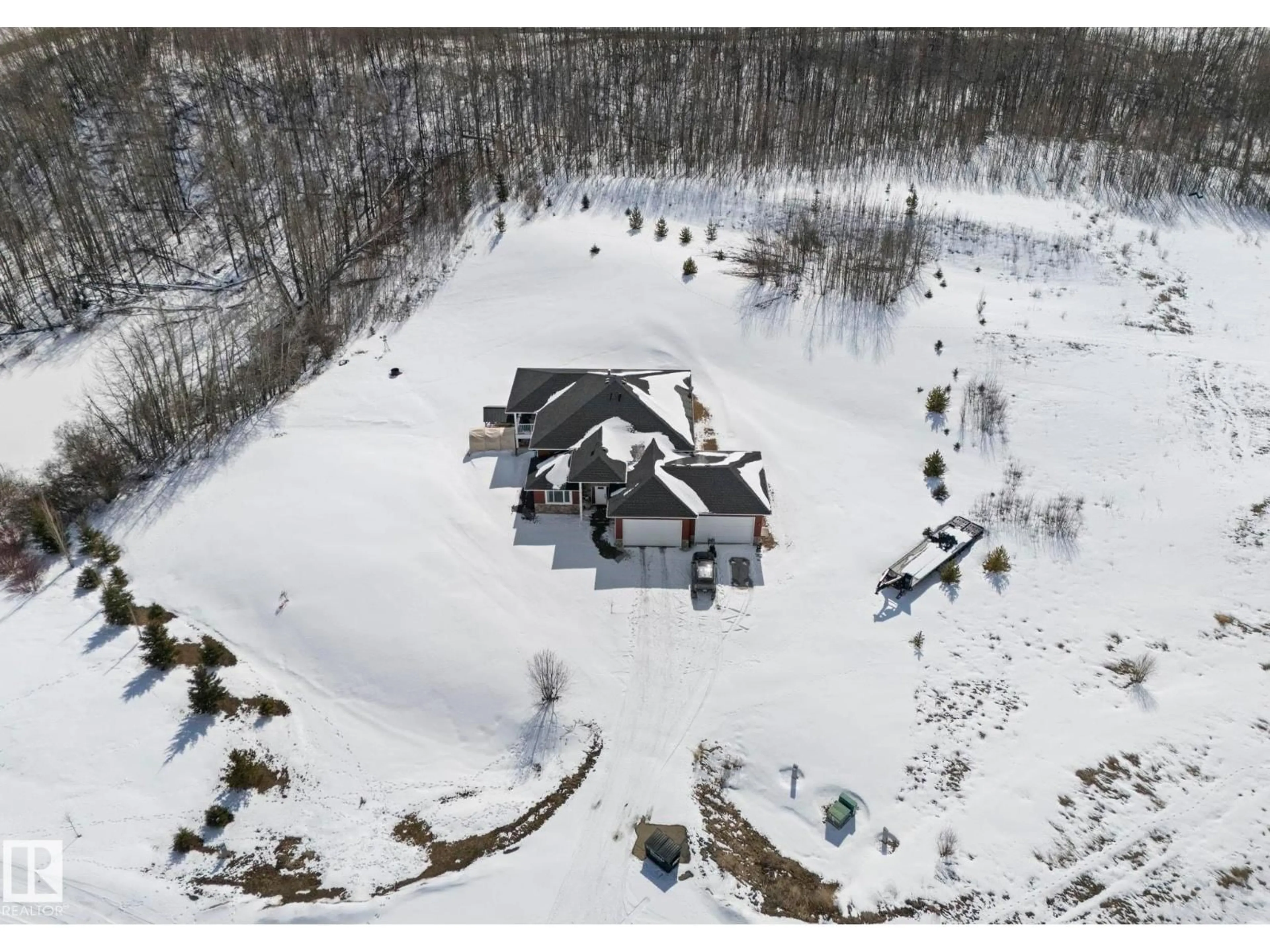 A pic from outside/outdoor area/front of a property/back of a property/a pic from drone, unknown for #7 - 53214 RGE ROAD 13, Rural Parkland County Alberta T7Y0C1